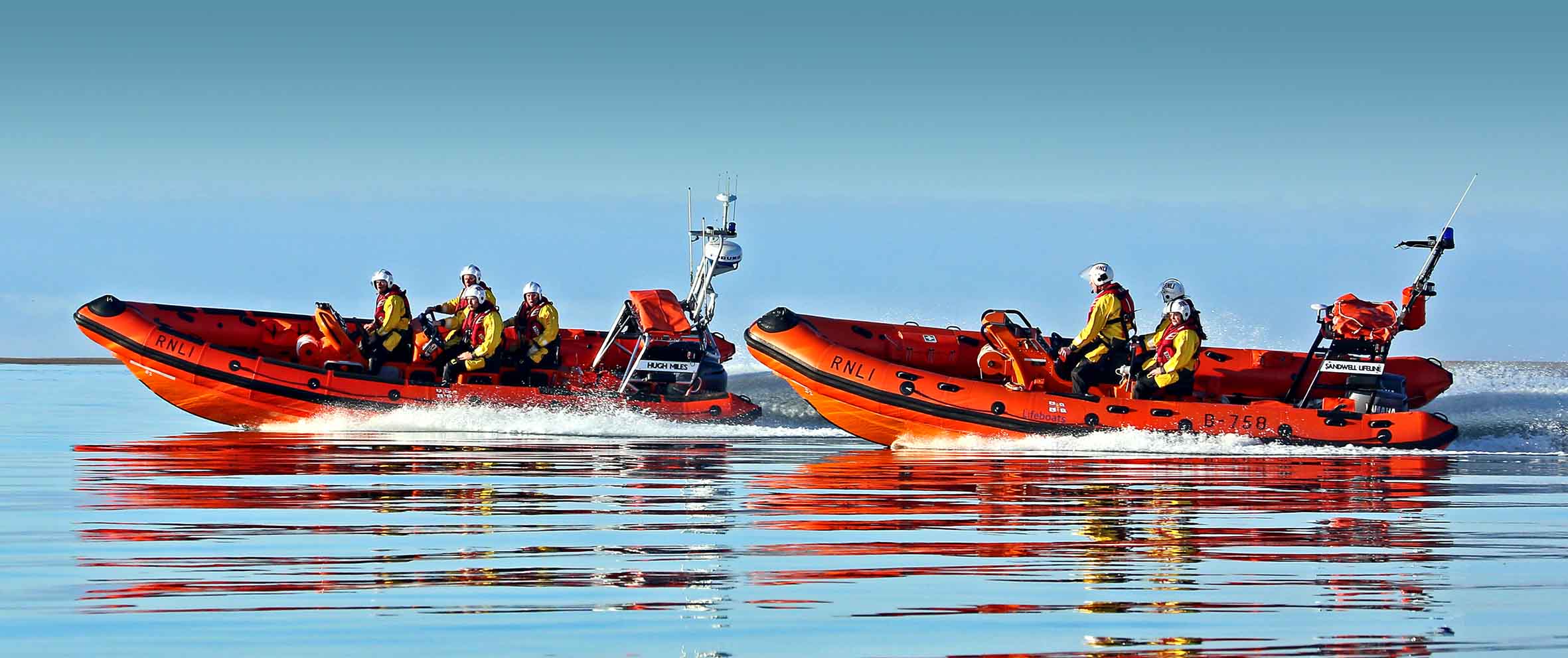 Attached are pictures of Aberdyfi RNLI’s Atlantic 75 lifeboat Sandwell Lifeline and the station’s new Atlantic 85 class lifeboat Hugh Miles on a final training exercise before the Sandwell Lifeline leaves Aberdyfi.
