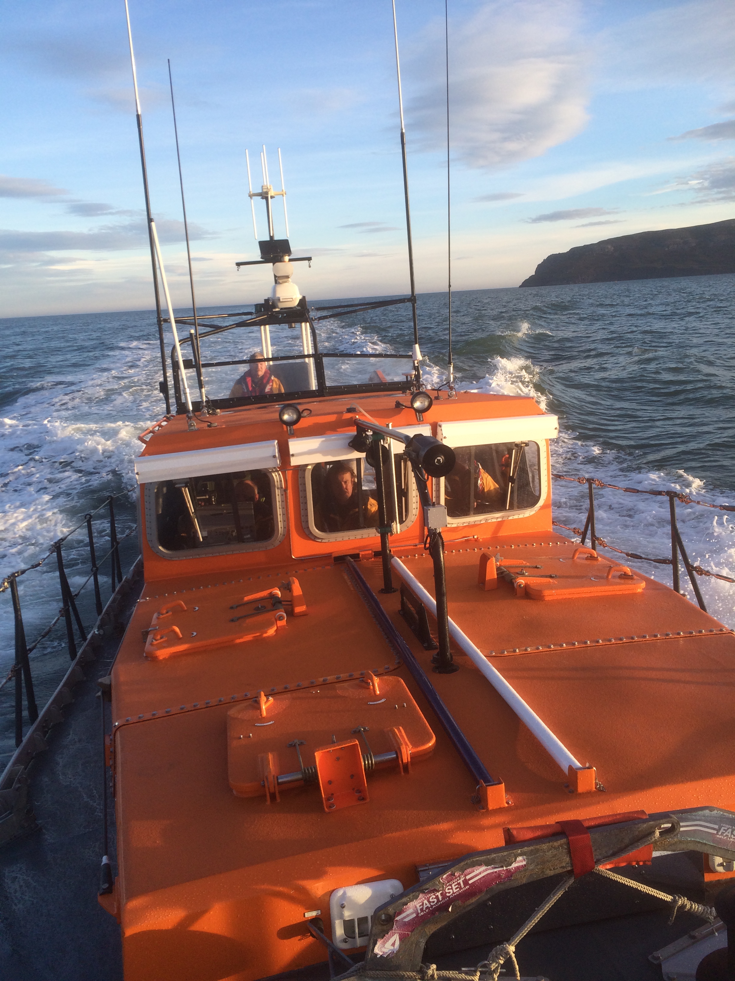 The RNLI relief lifeboat Lady of Hilbre leaves Great Orme's Head astern for the very last time as she heads for Conwy