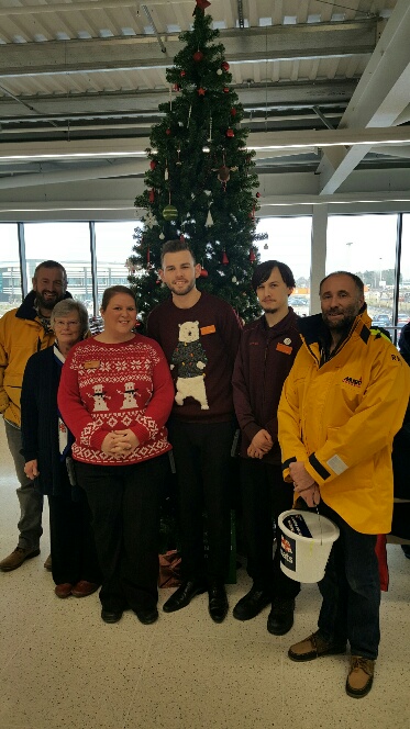 Organiser Jan Pearce, crew members and Sainsbury's staff.