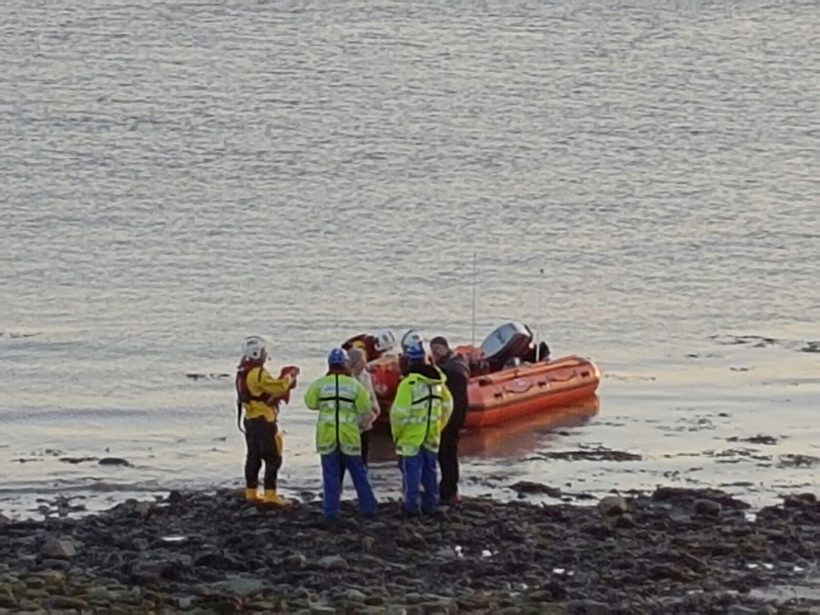 People being brought to shore