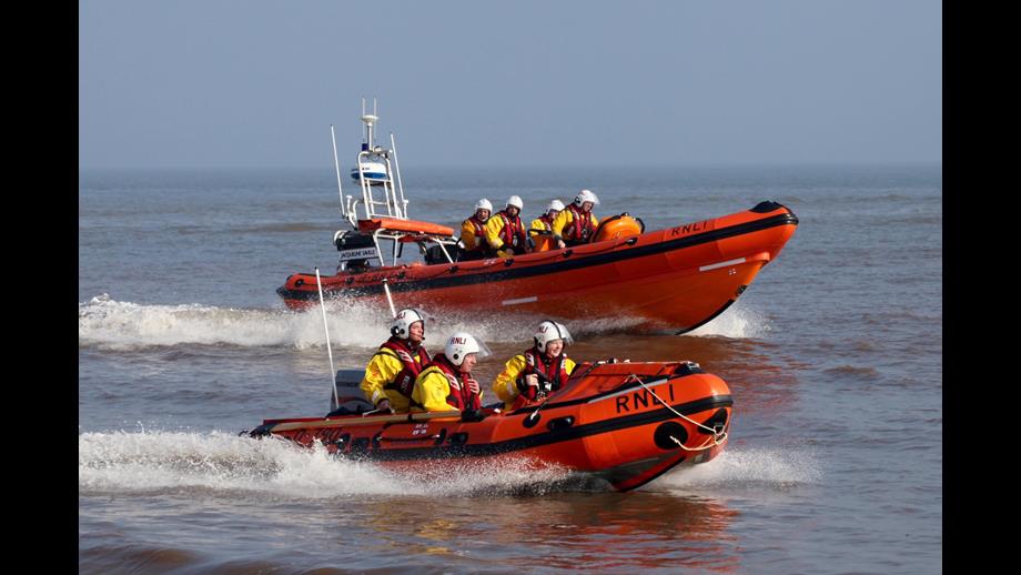 Mablethorpe RNLI Volunteers Putting Out The Flags For Their Big Day RNLI mablethorpe-rnli-volunteers-putting-out-the-flags-for-their-big-day-rnli