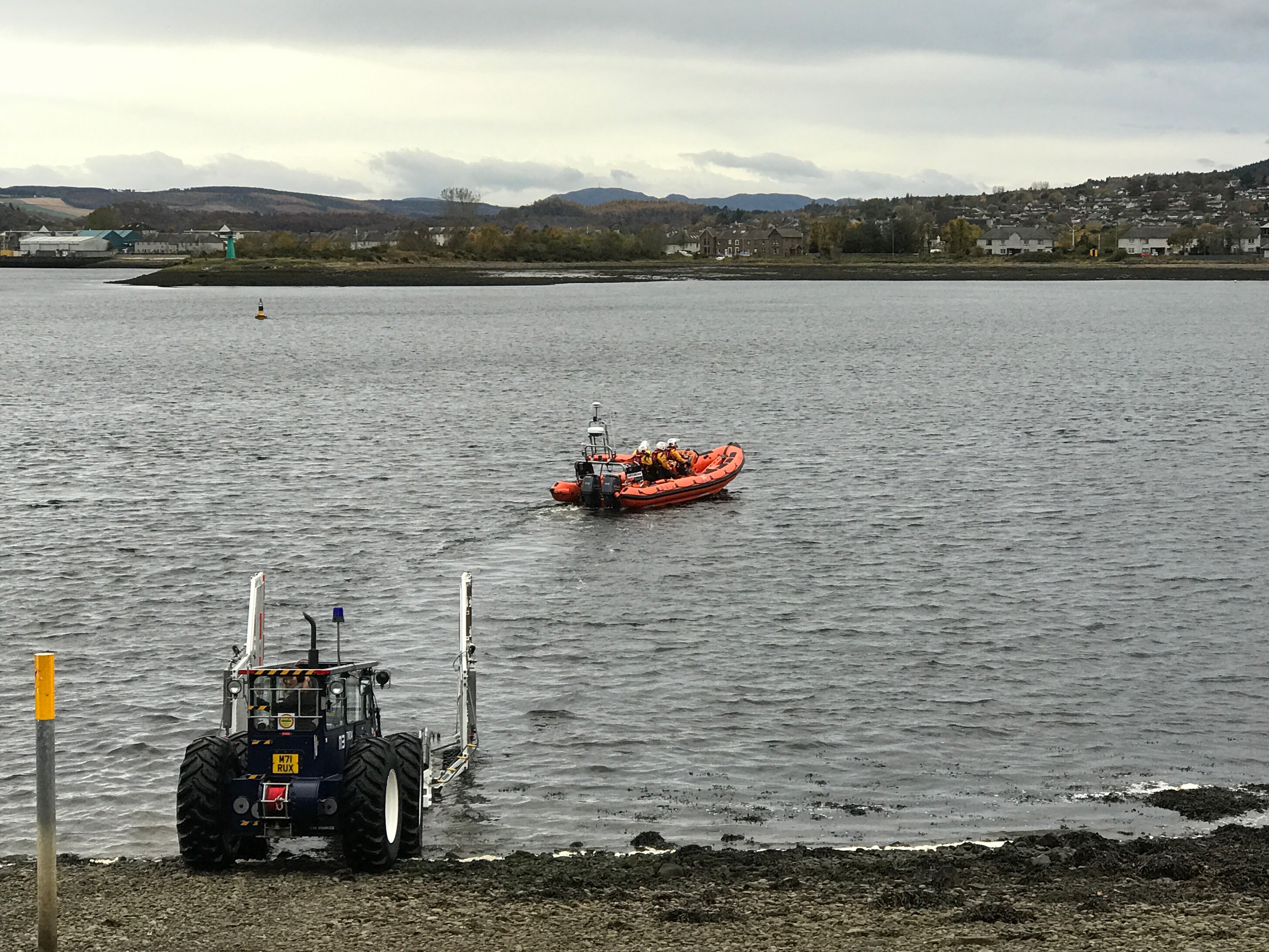 Lifeboat leaves launch trailer and heads off to sea