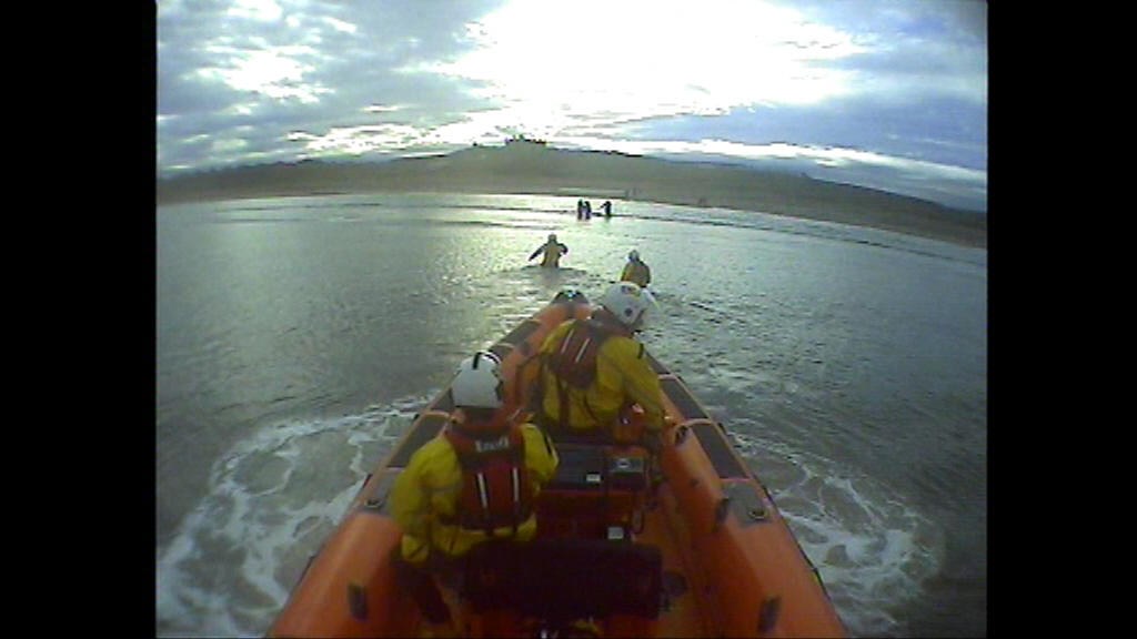 A group of dog walkers had to be rescued after they were cut off by the tide at Marske, North Yorkshire on Monday 14 November 2016.