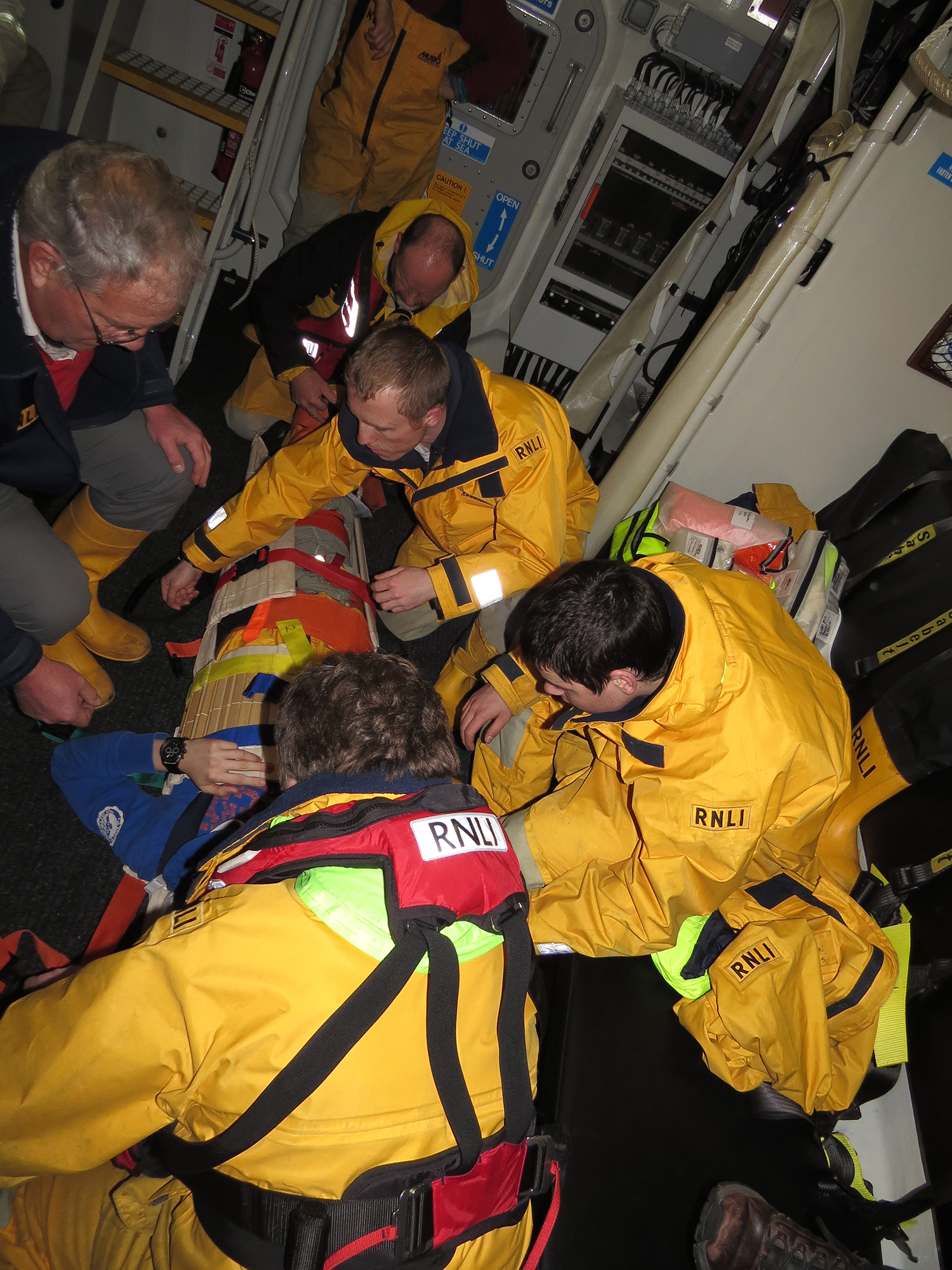 Volunteer crew members undergo intensive first aid training