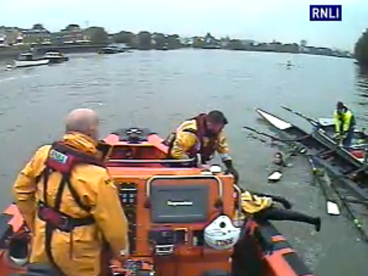 Capsized rowers recovered into the lifeboat