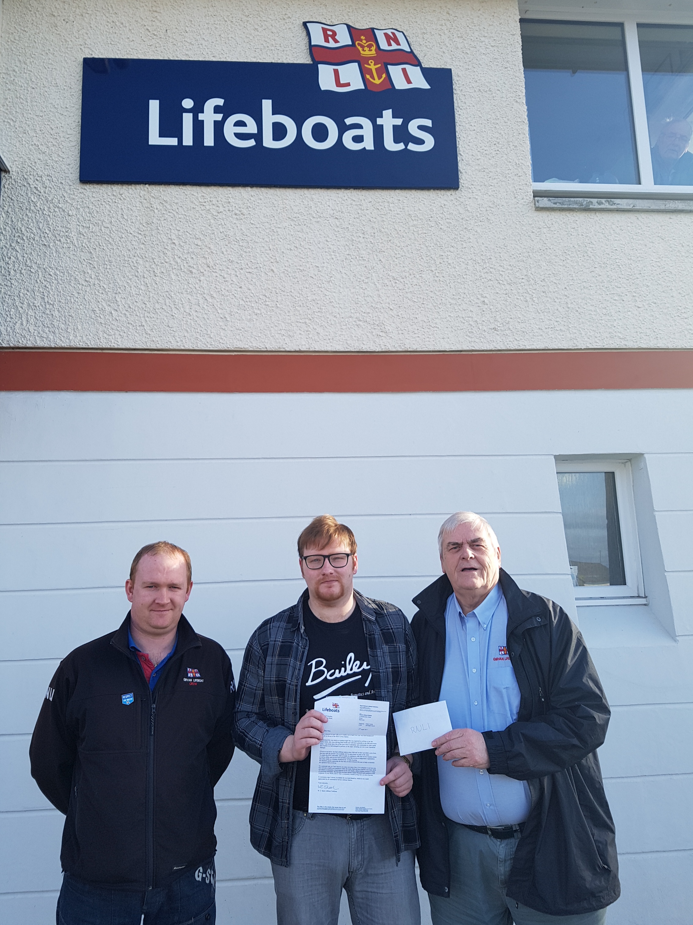 Pictured is JP Gourlay (centre) handing over the £300 to Girvan Lifeboat treasurer Billy Steel (right) and receiving a letter of thanks with lifeboat crew John Tait (left) who also assisted on the evening