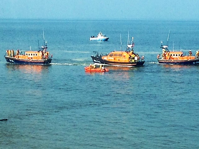 on exercise and top scatter former 2nd Coxswain Gerald Hughes' ashes