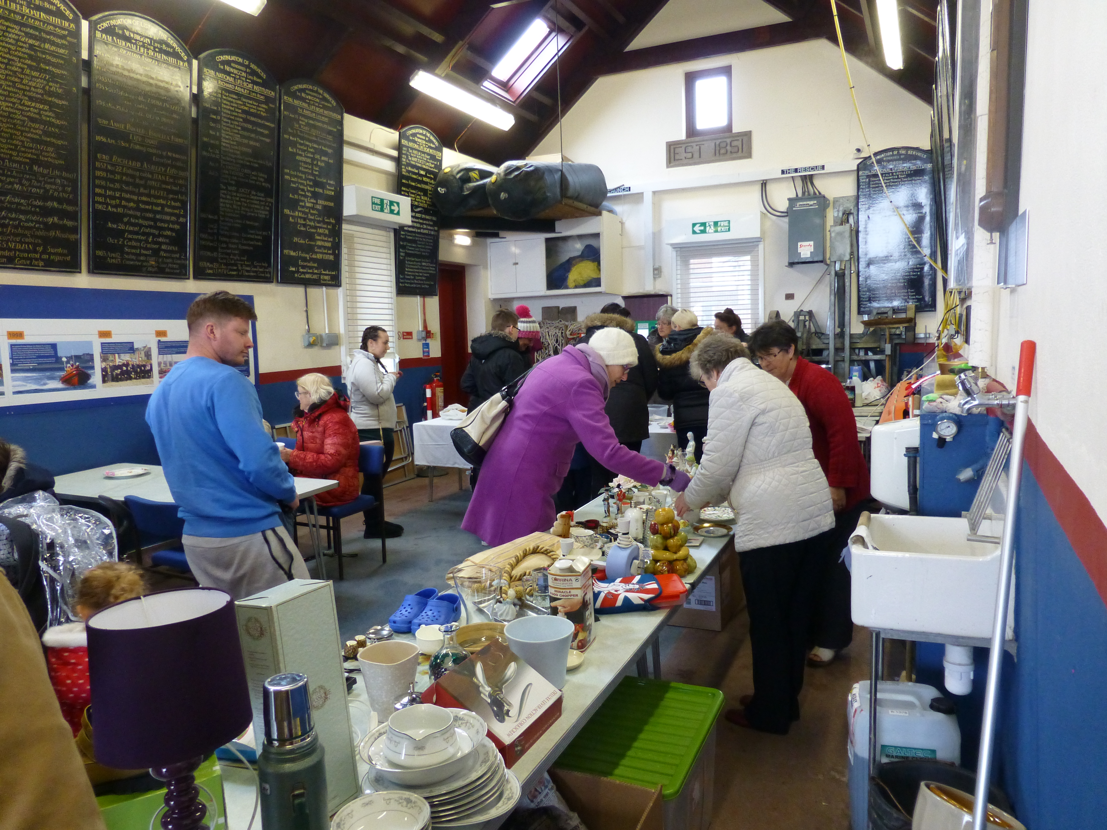 The fancy goods stall team are kept busy