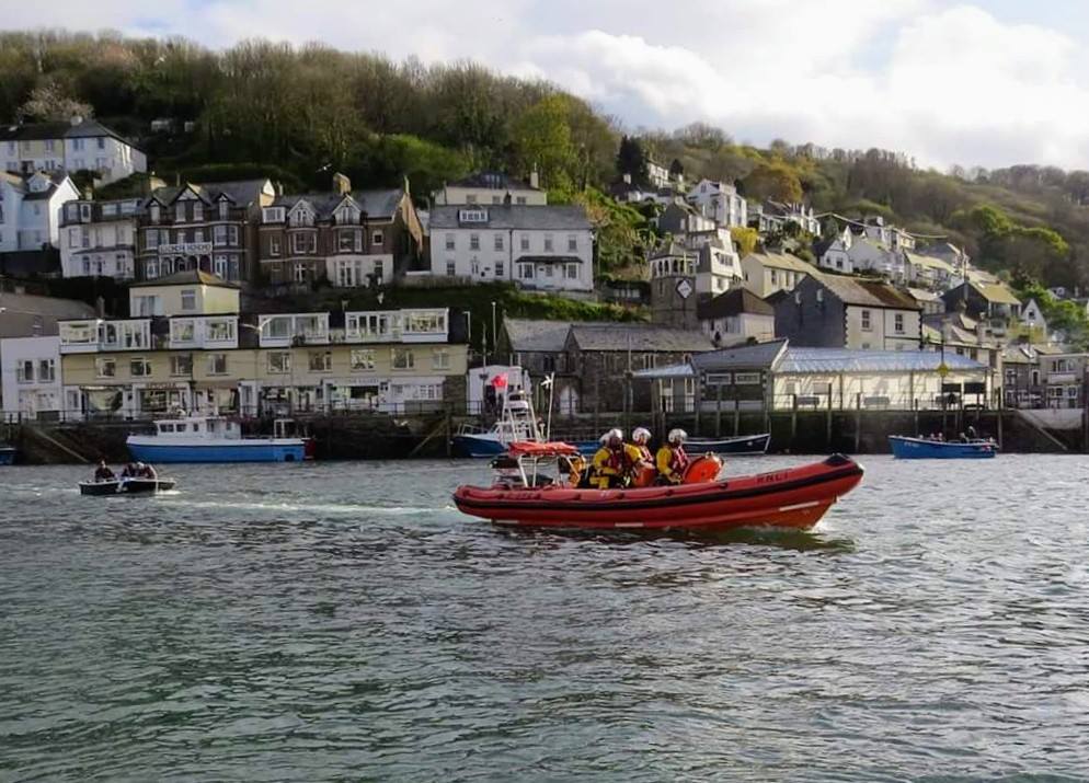 Looe RNLI Atlantic 85 Sheila and Dennis Tongue II towing the Dory boat in Looe River

