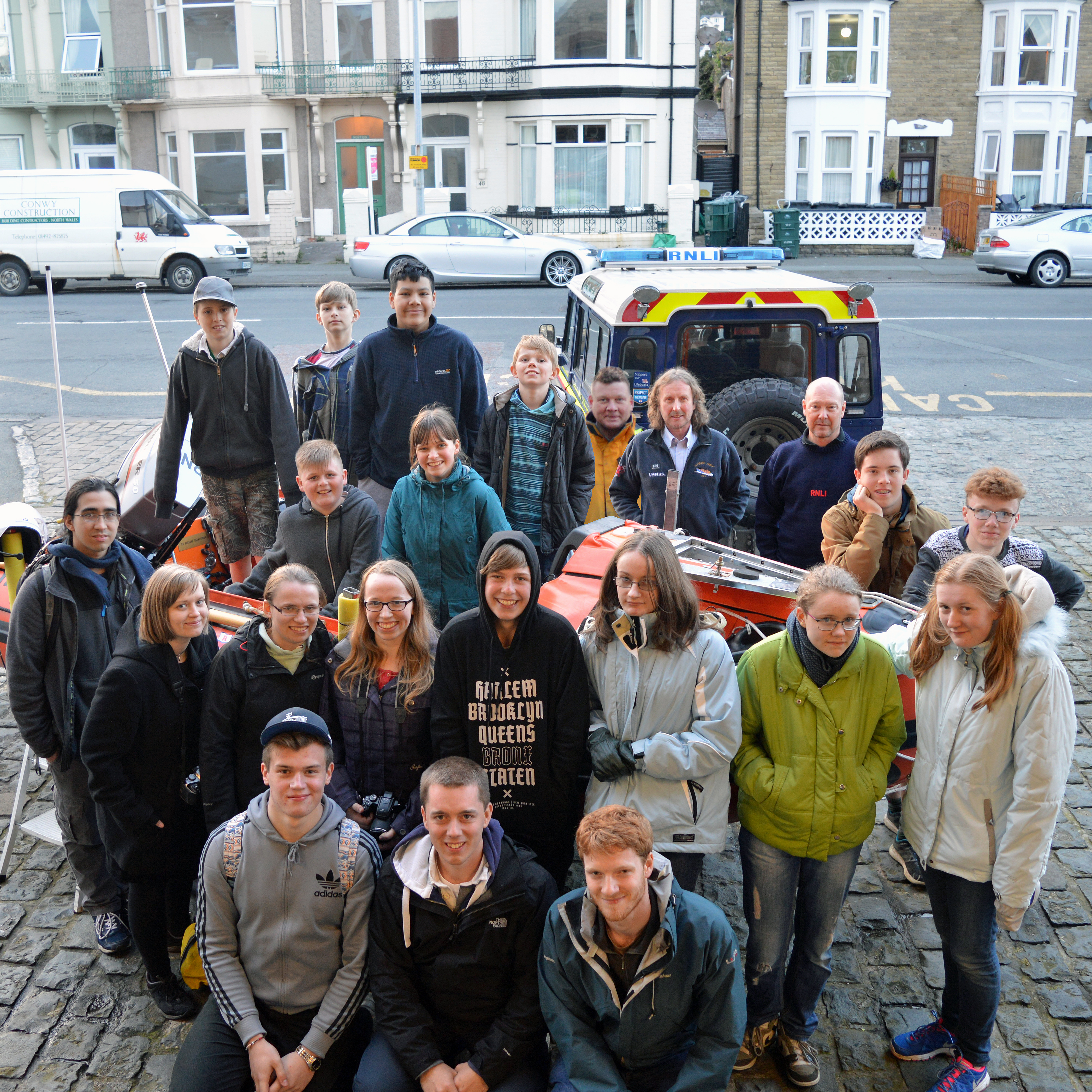 Members of the Wolverton Evangelical Church, Milton Keynes.with lifeboat Coxswain Graham Heritage and Second Coxswain Tim James grouped in, on, and around the station's inshore lifeboat 'Dr Barbara Saunderson'.