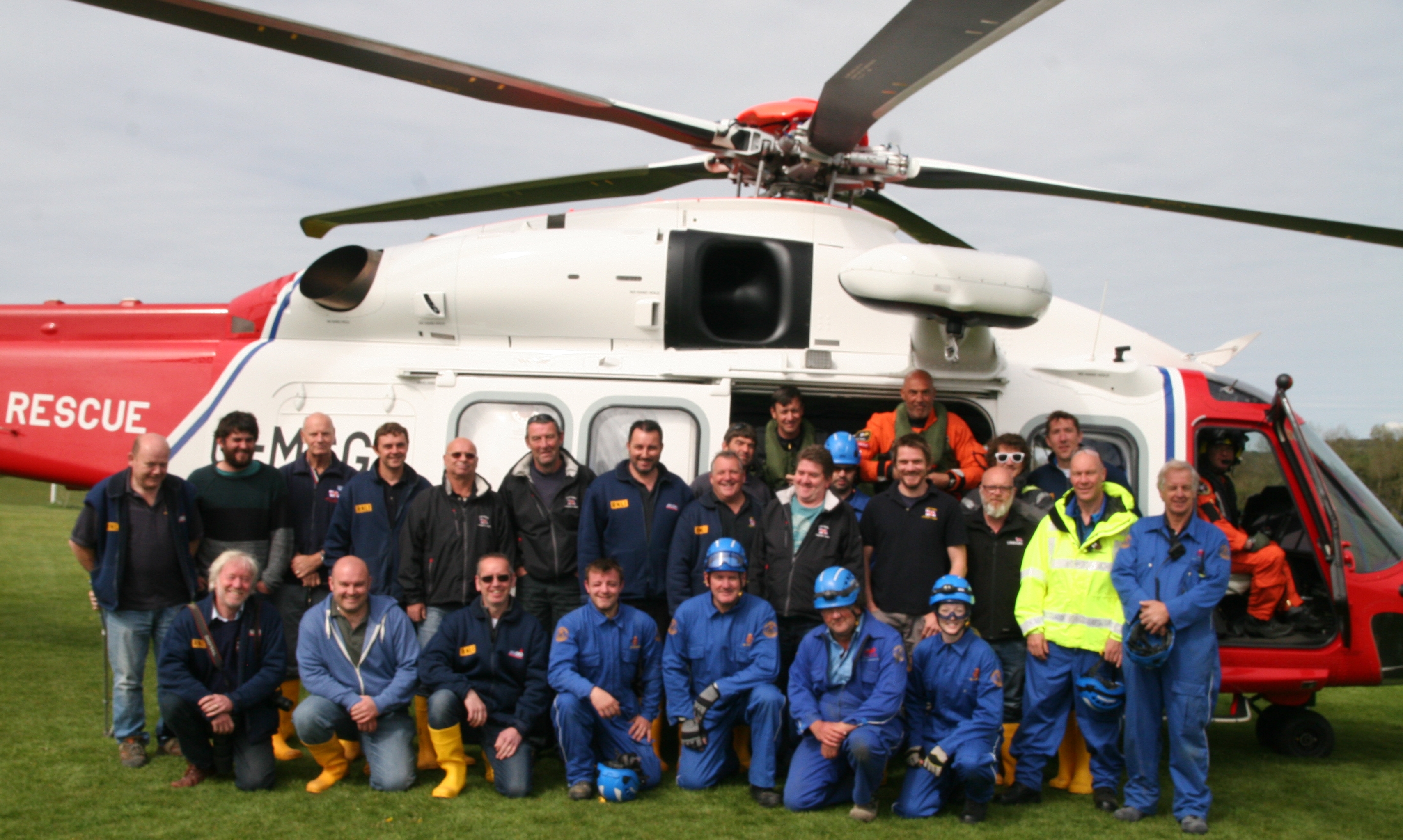 Members of the crew of the Lyme Regis RNLI lifeboat, local coastguards and the helicopter team.