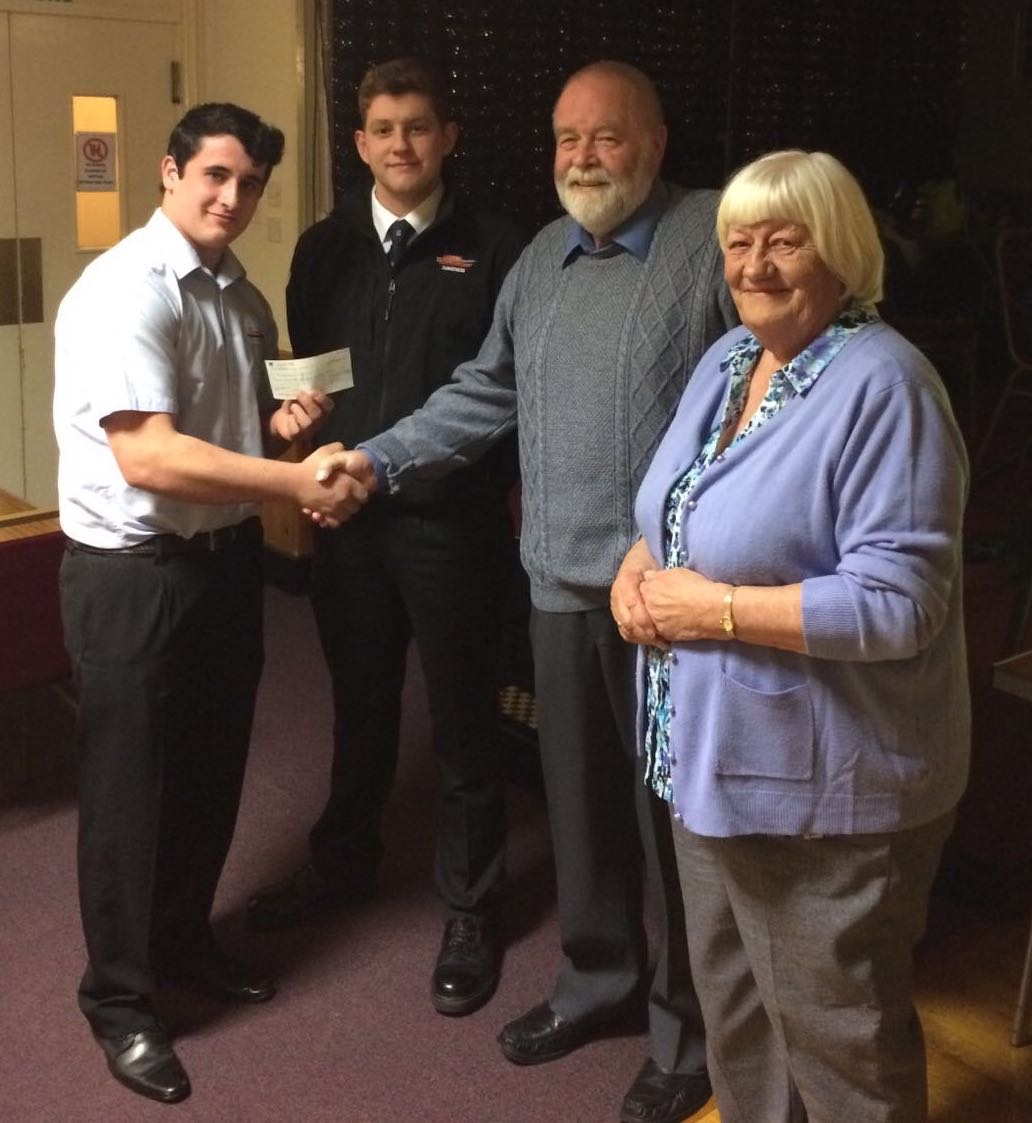 Dungeness volunteer crew and fundraisers holding cheque