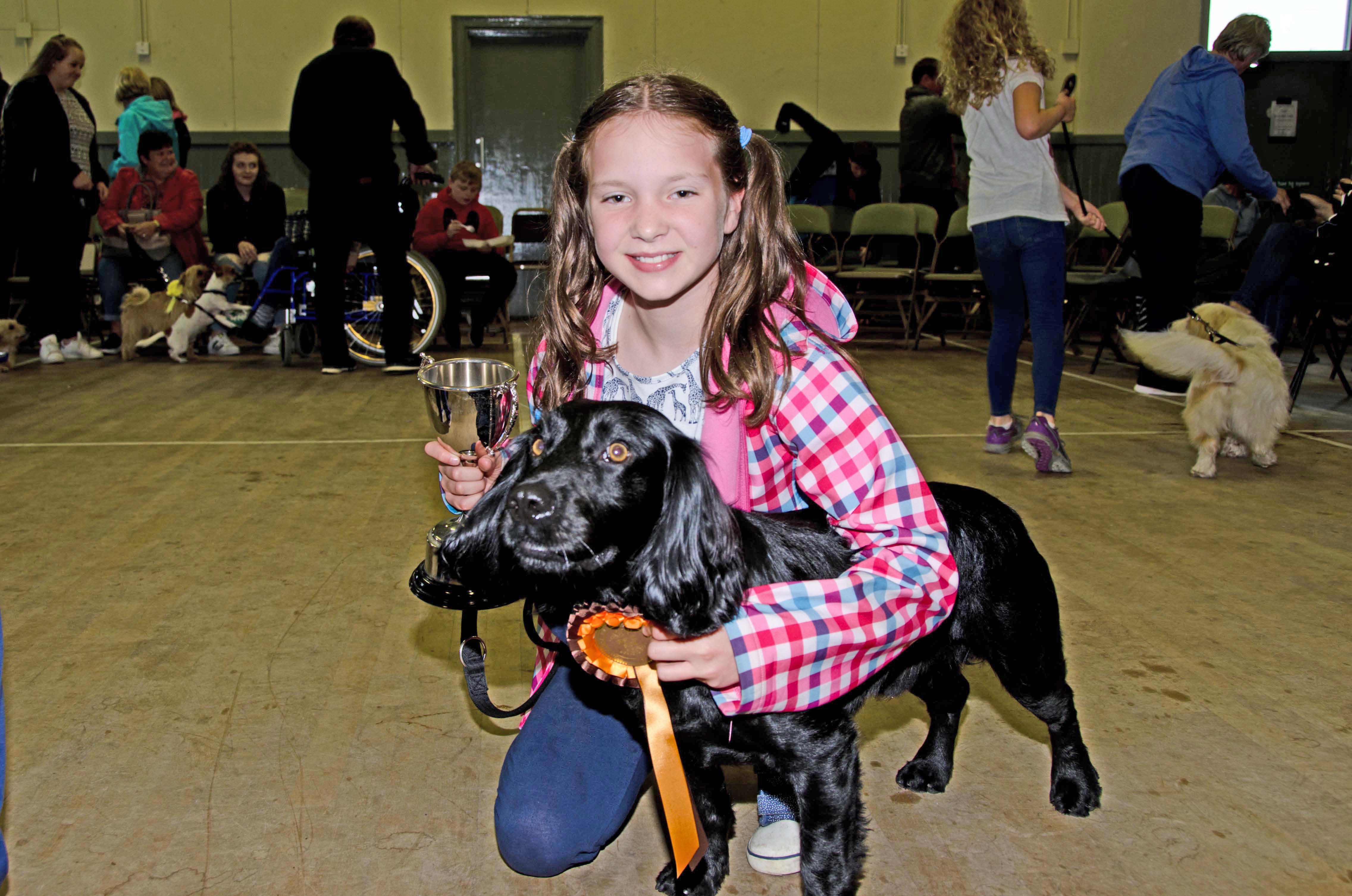 Pet show best tricks winner and best in show, Jarvis (Cocker) and owner Grace