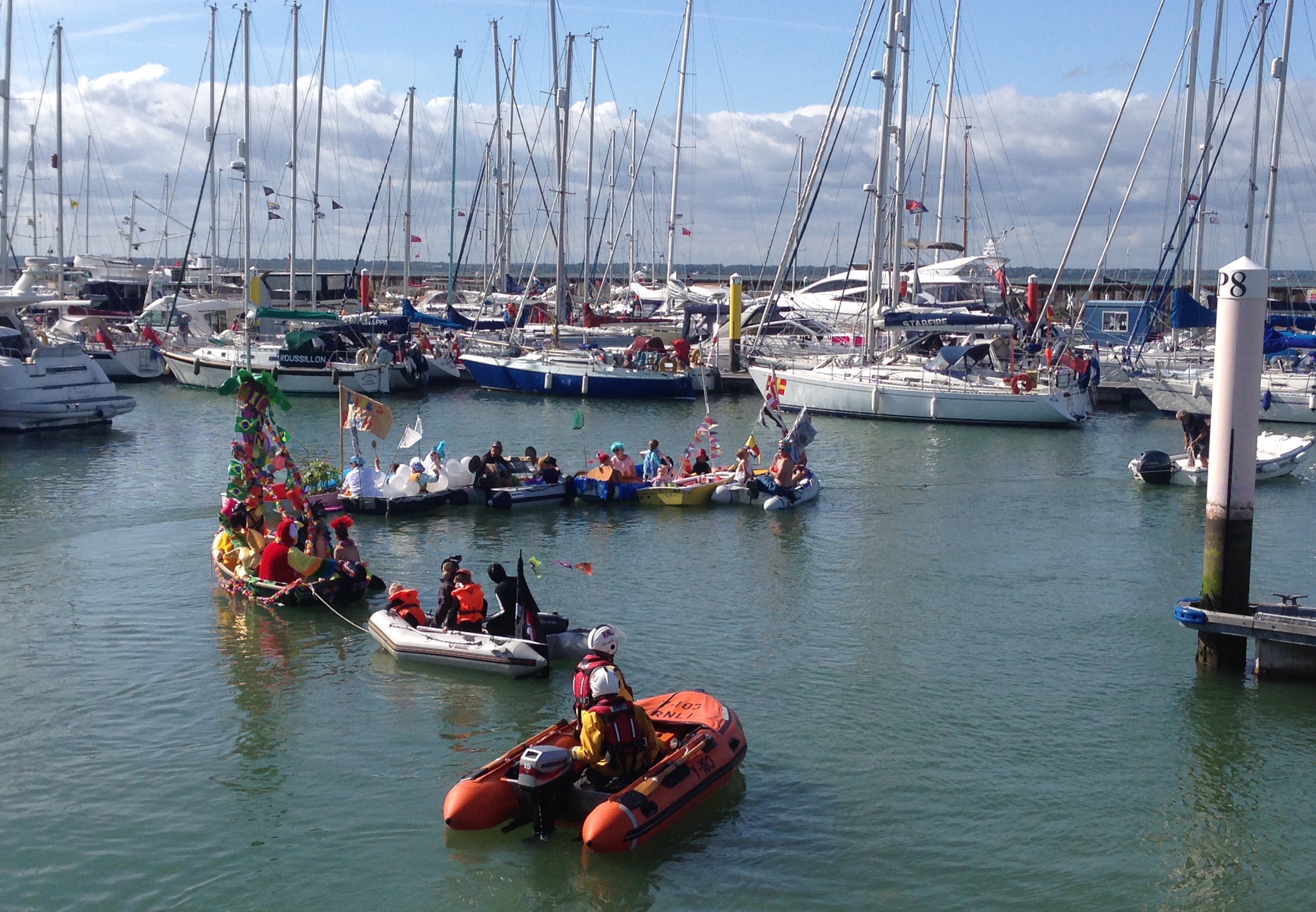 Yarmouth RNLI Y-boat acting as safety boat during Yarmouth Carnival's Decorated Dinghies Competition yesterday afternoon.