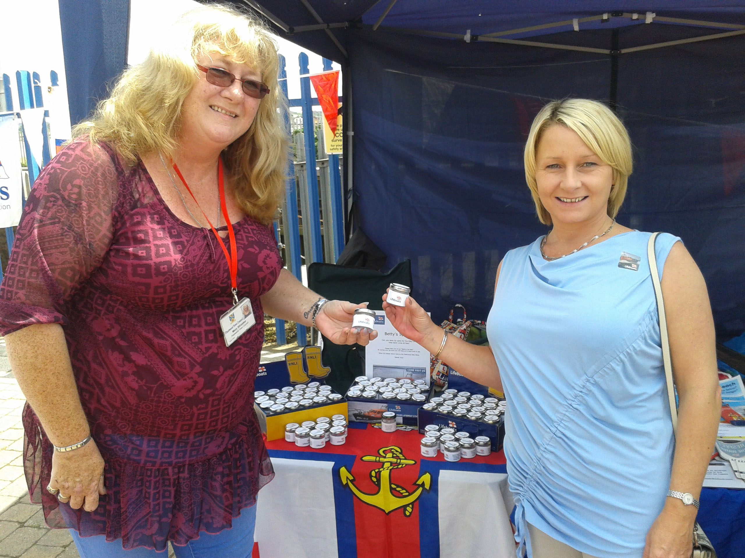 Fleetwood Councillors Emma Anderton and Mary Stirzaker collecting their ‘Pots’ at Fleetwood Lifeboat Day