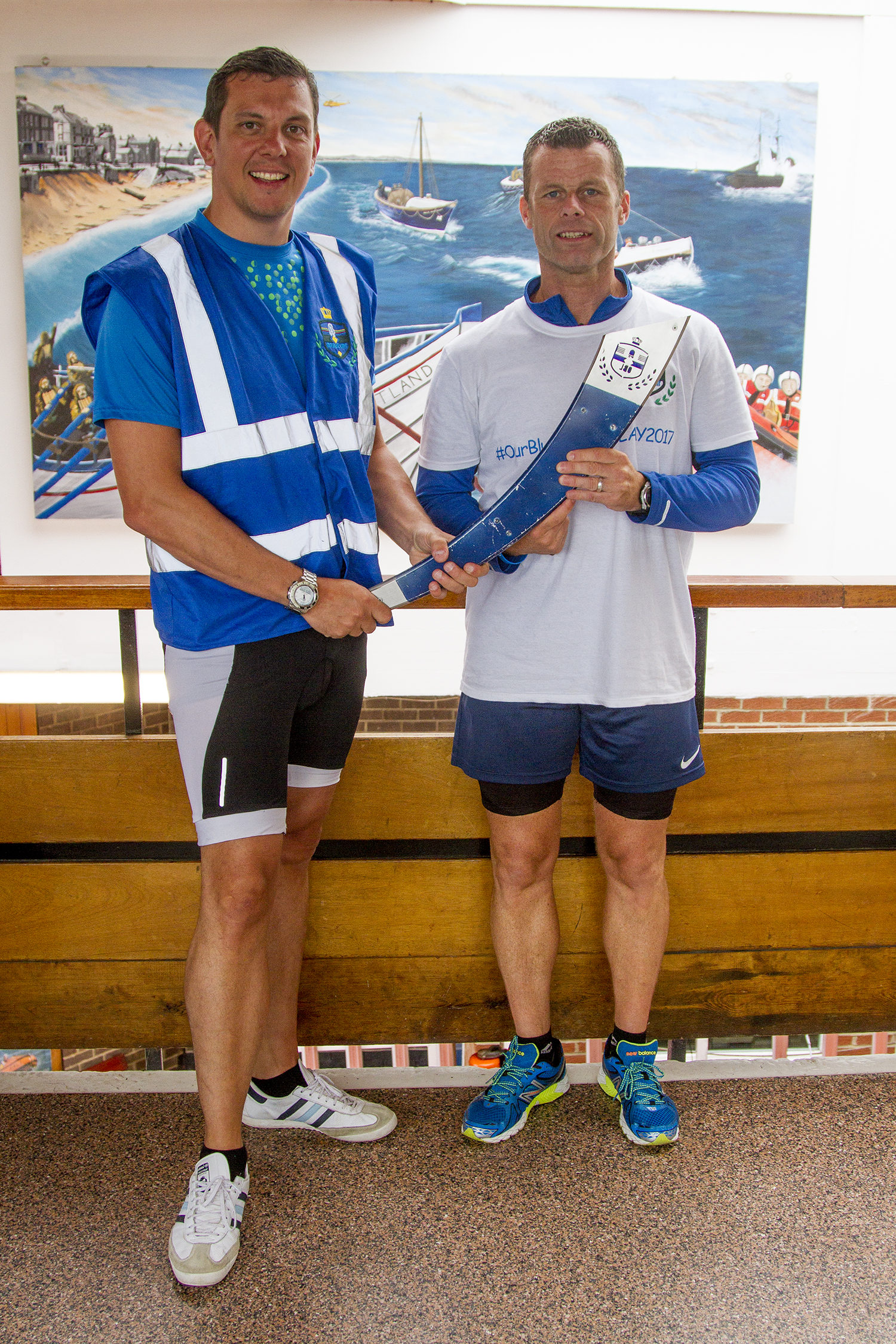 Ian Widdas (left) and Phil Spencer of Cleveland Police at Redcar lifeboat station with the Our Blue Light torch