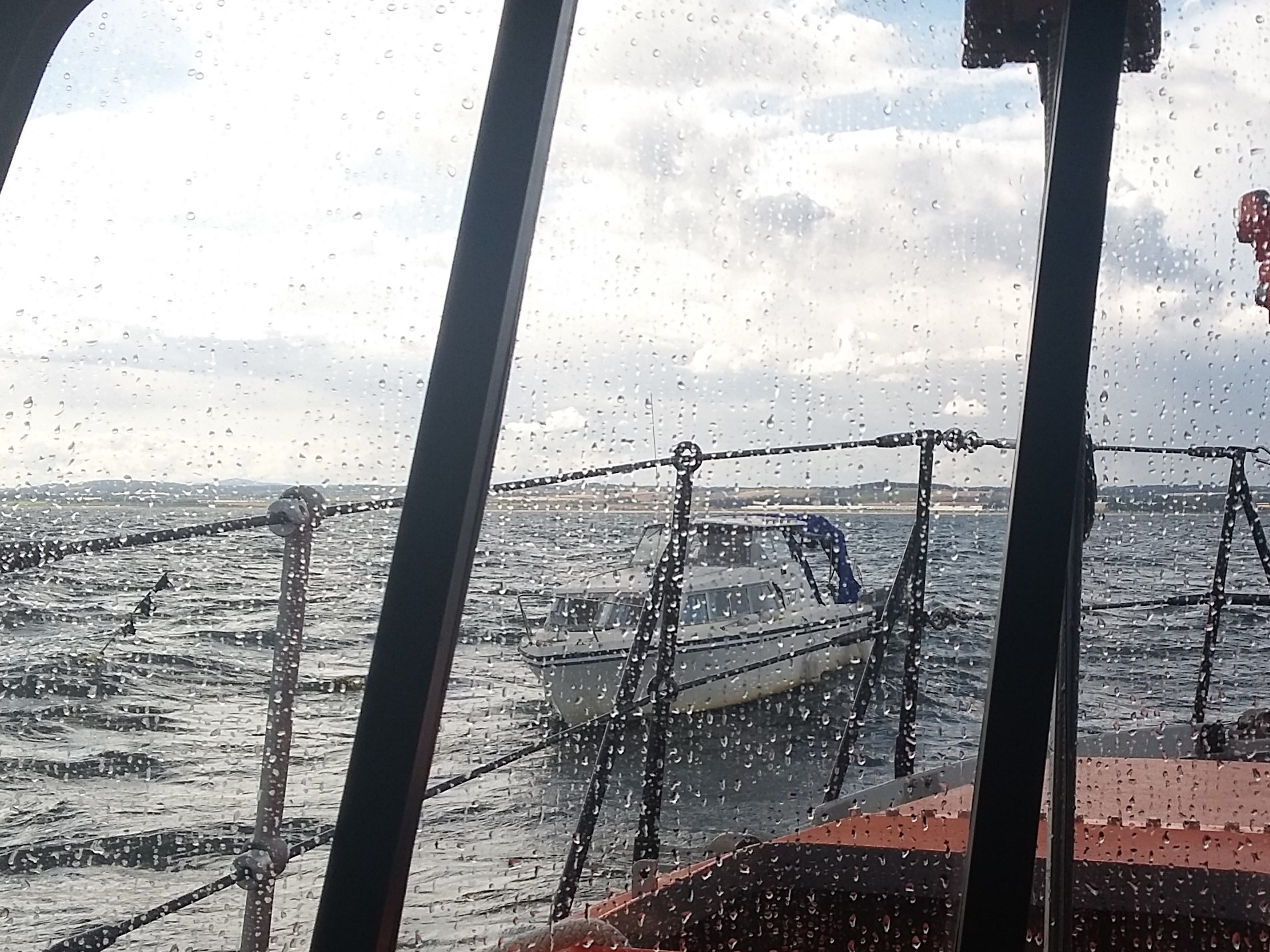 ALB alongside motor boat before tow