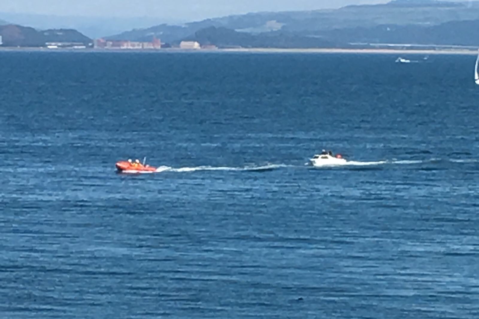 Mumbles lifeboat towing fishing boat to Knab Rock Mumbles