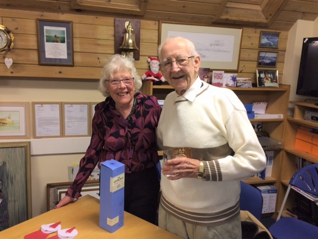 Eric receives his gift from Wendy Posford