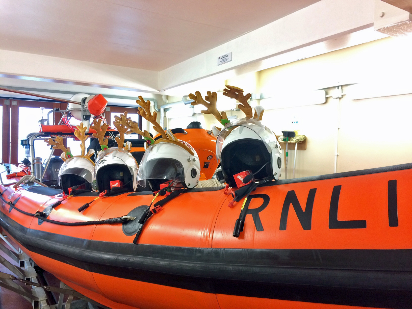Taken in the lifeboat, showing the helmets with antlers.