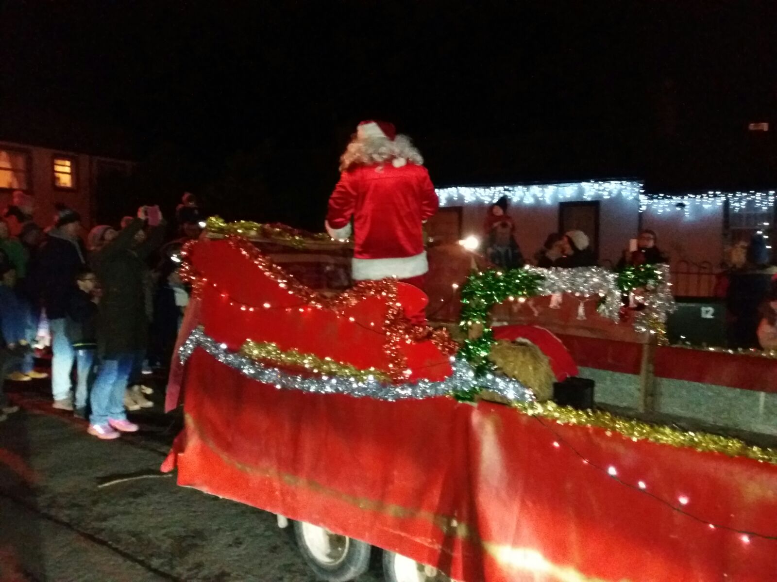 Santa distributing sweets on his way to St Bees lifeboat station 