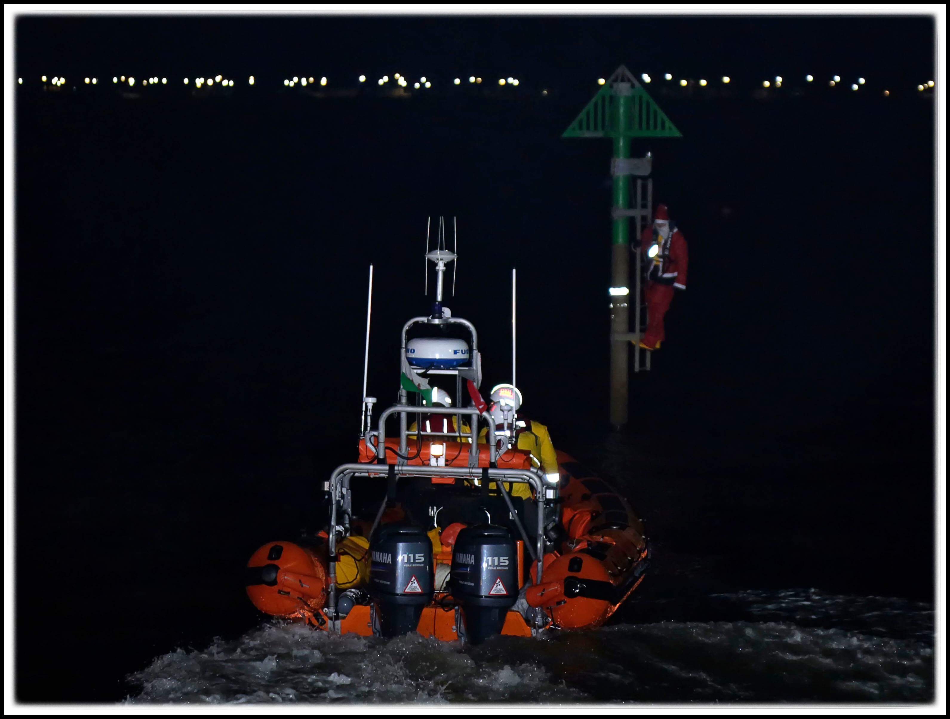 Santa is found by volunteer crew clinging to a marker post.