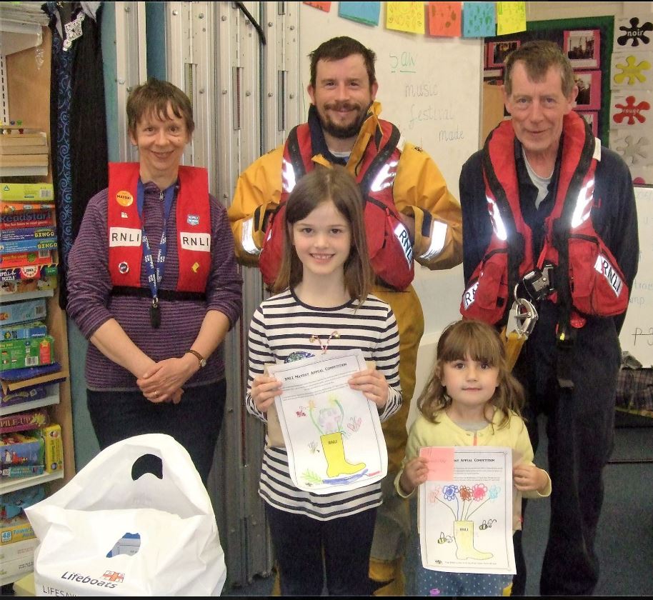 Carolyn McHaffie with the Tobermory Coxswain and second mechanic