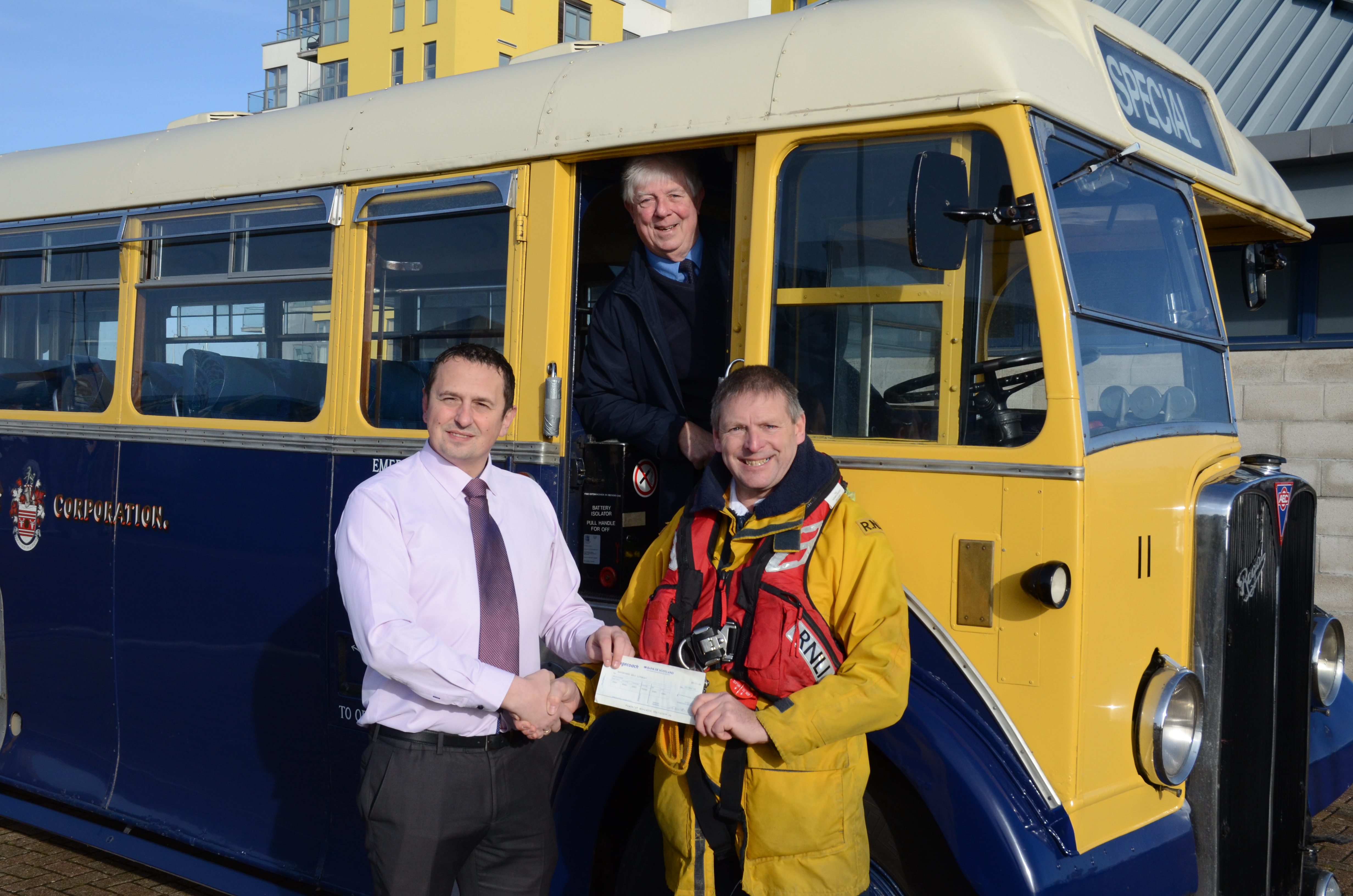 Stagecoach manager presents cheque to Coxswain Mark Sawyer