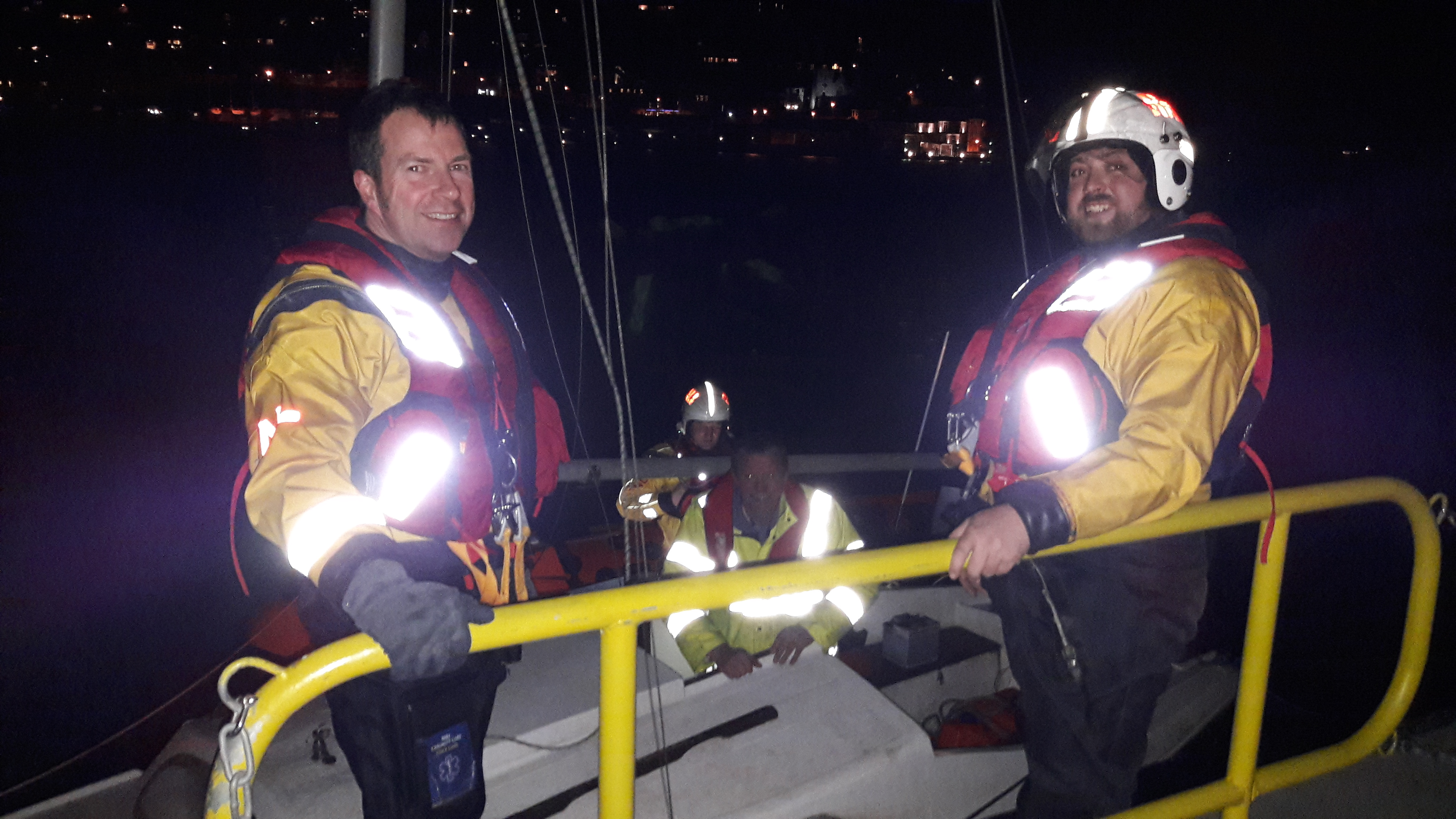 Kevin Murpy, helmsman on the left. Will Davis, a recent volunteer to join the crew on the right