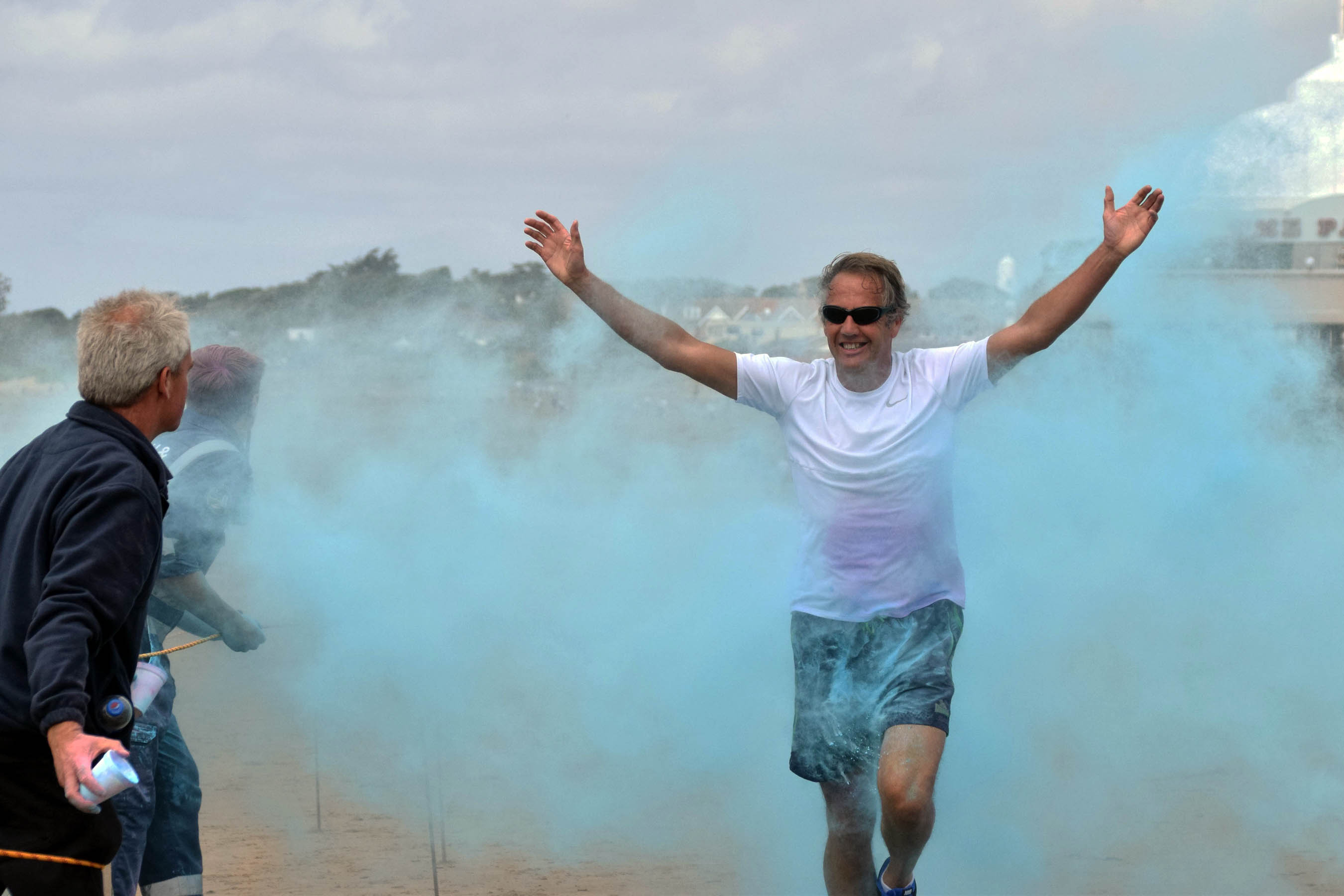A runner passes through a paintpoint