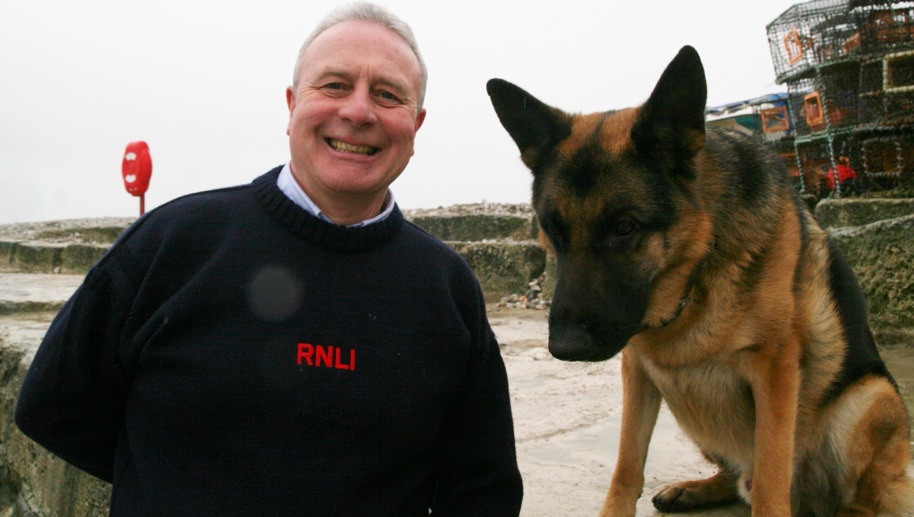 Mike McAlpine is pictured with his four year old German shepherd, Bruno