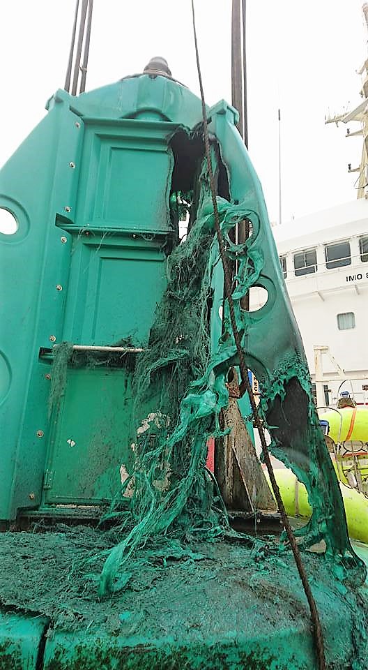 The remains of the buoy being removed by Trinity House