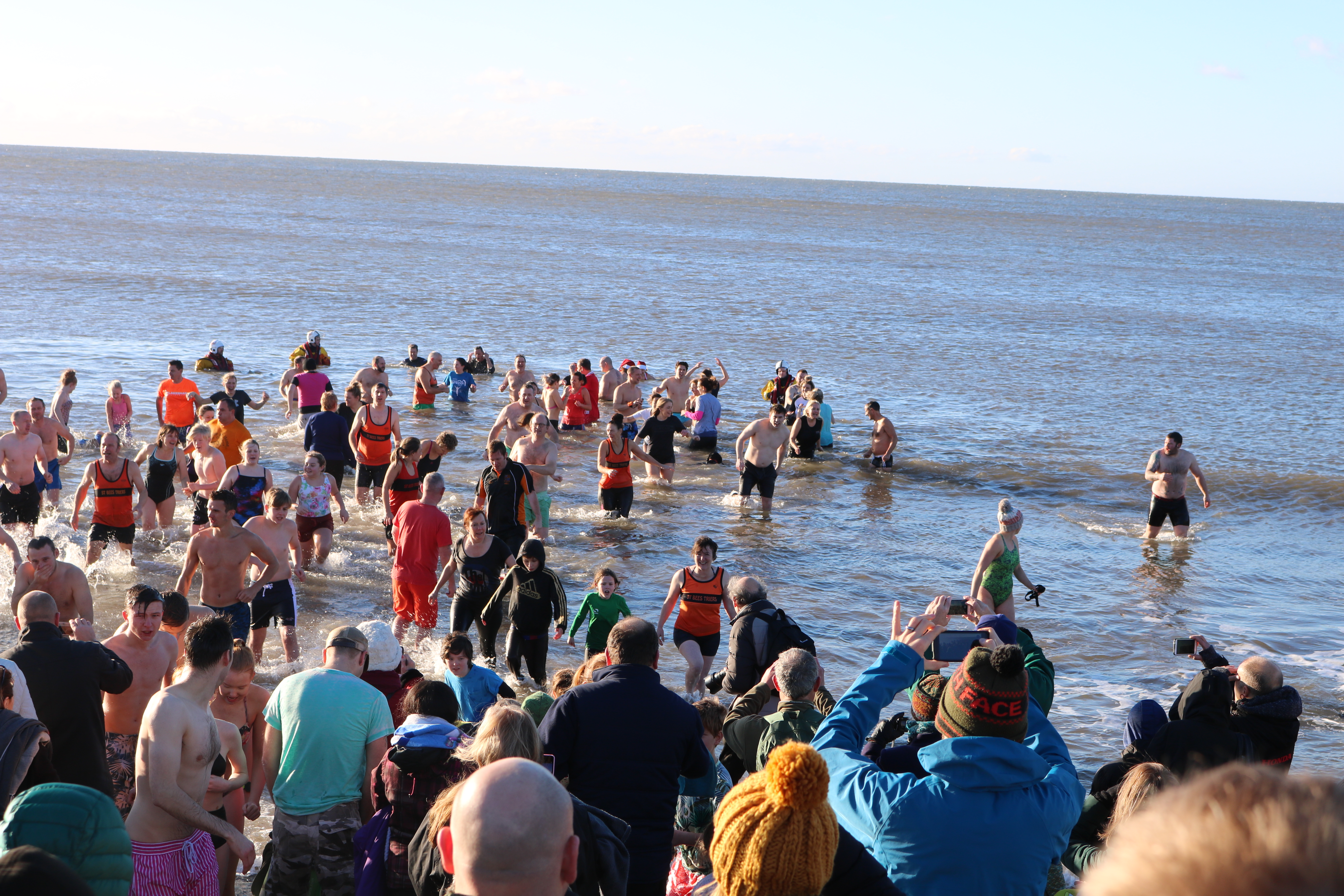 The brave swimmers going in to the Irish Sea
