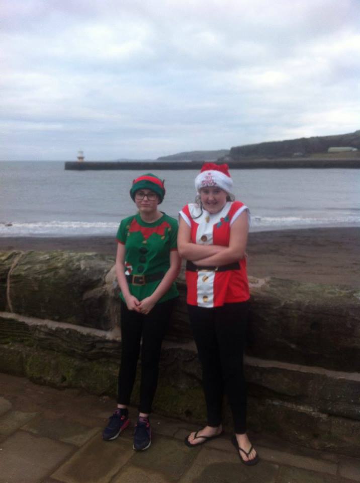 Kelsey and her friend looking cold even before the dip in the sea