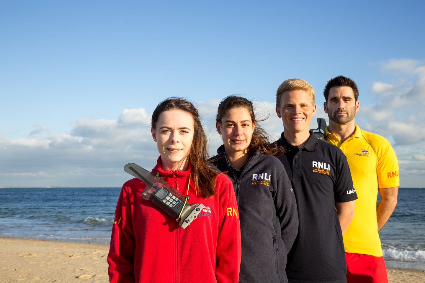 Lifeguards and face to face fundraisers together on the beach