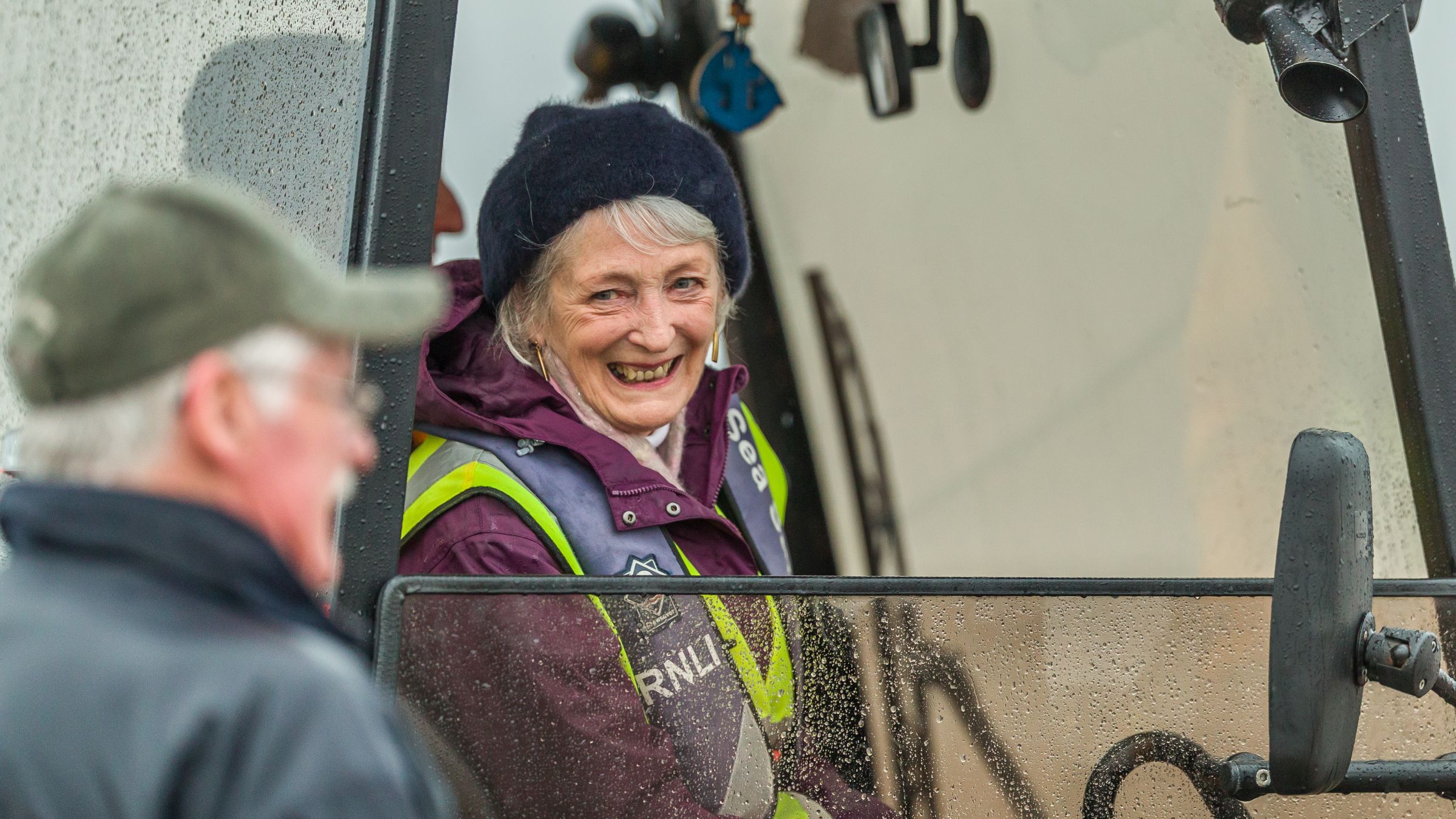 Donor, Pauline Smith rides in the launching tractor