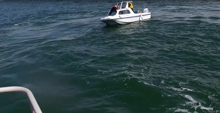 Boat being towed
