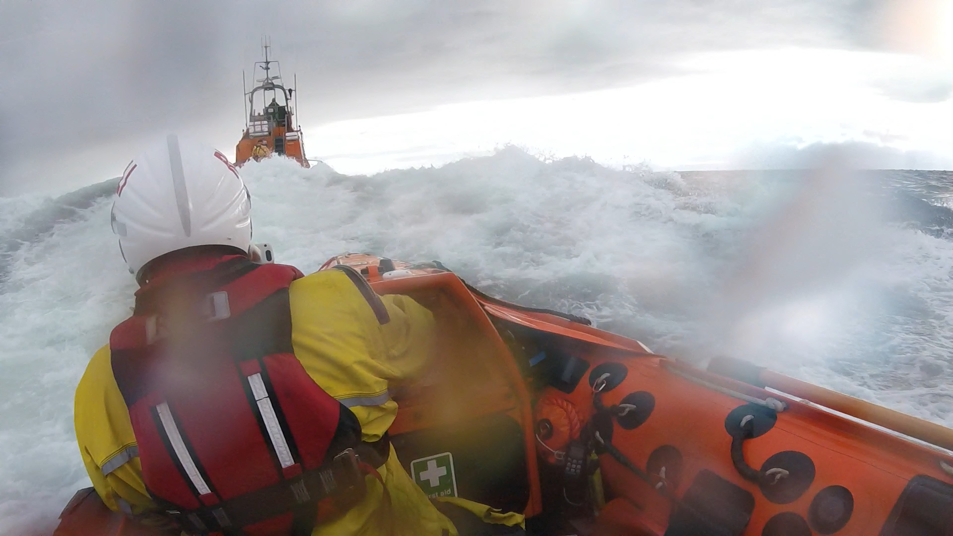 Troon inshore lifeboat heading to the position of the sailing yacht in the wake of the all-weather lifeboat