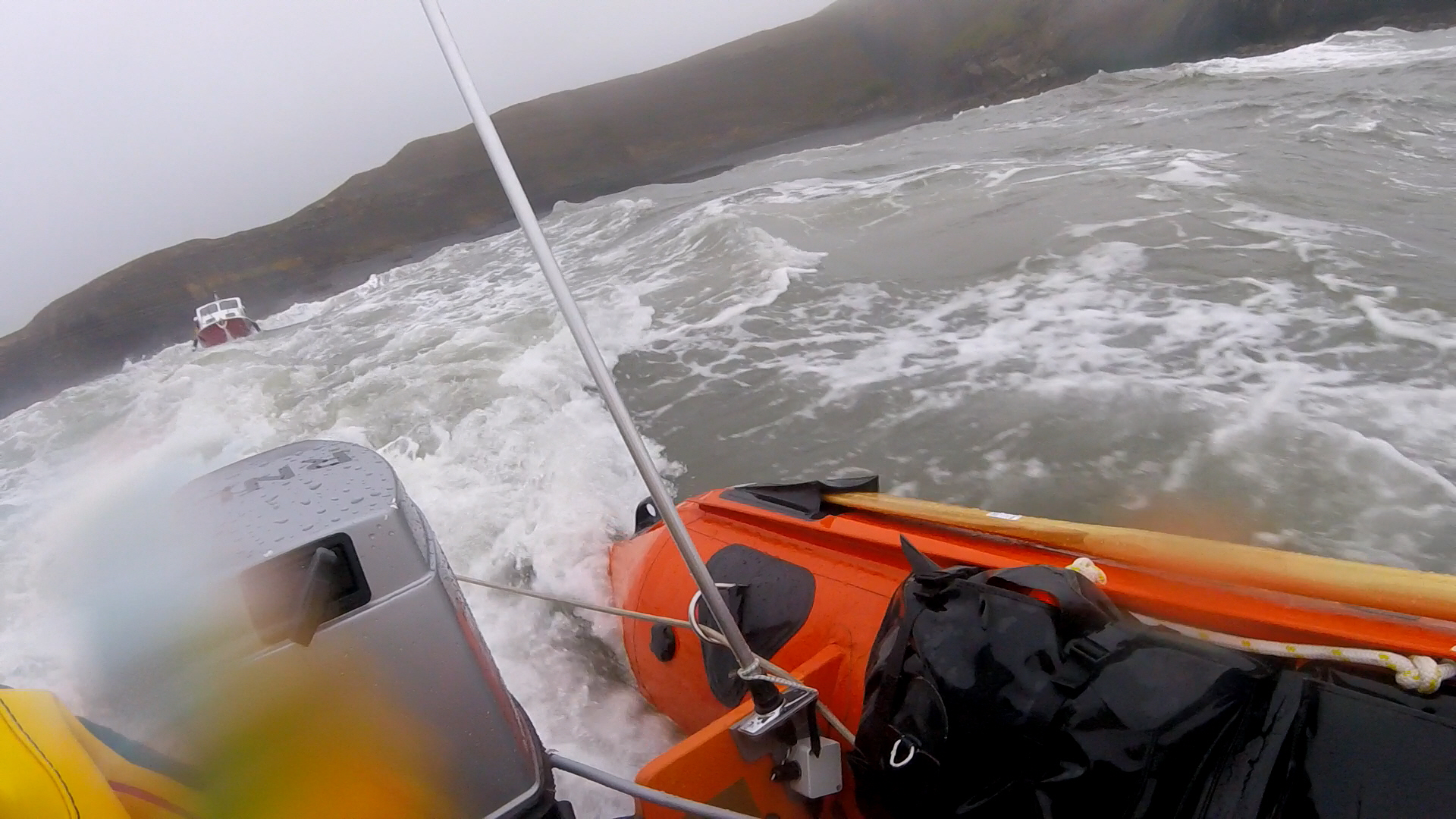 D Class tows the casualty through the surf