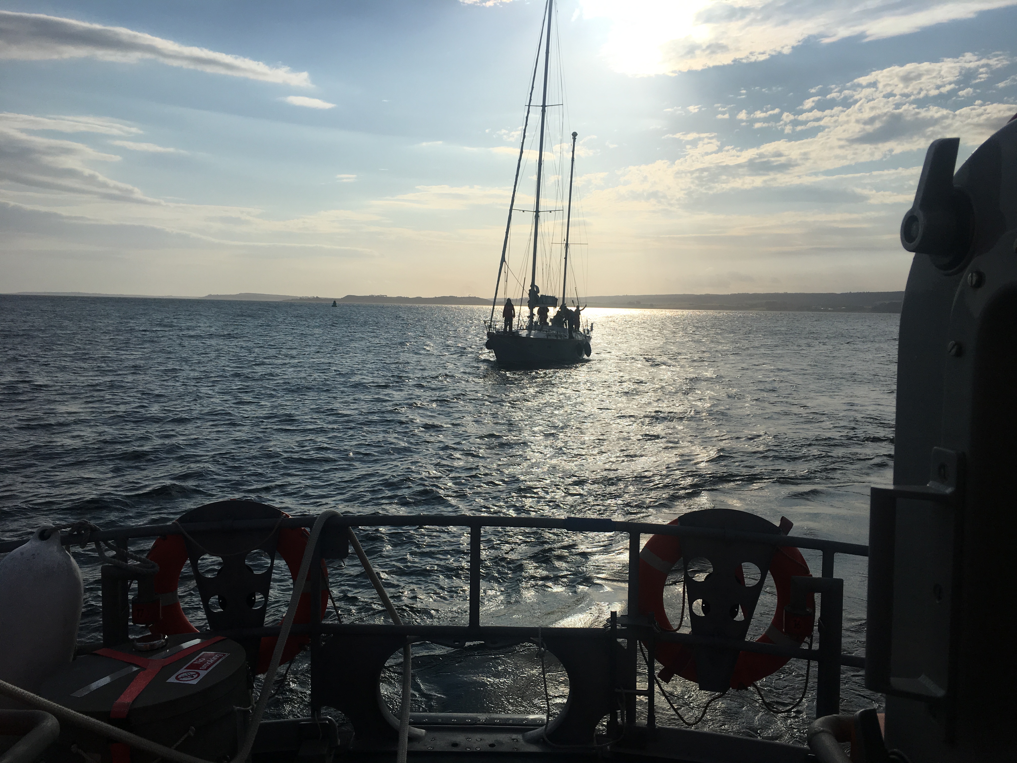 Invergordon Lifeboat with causality vessel under tow