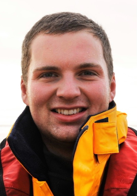 A lifeboat crew member in his protective jacket and lifejacket