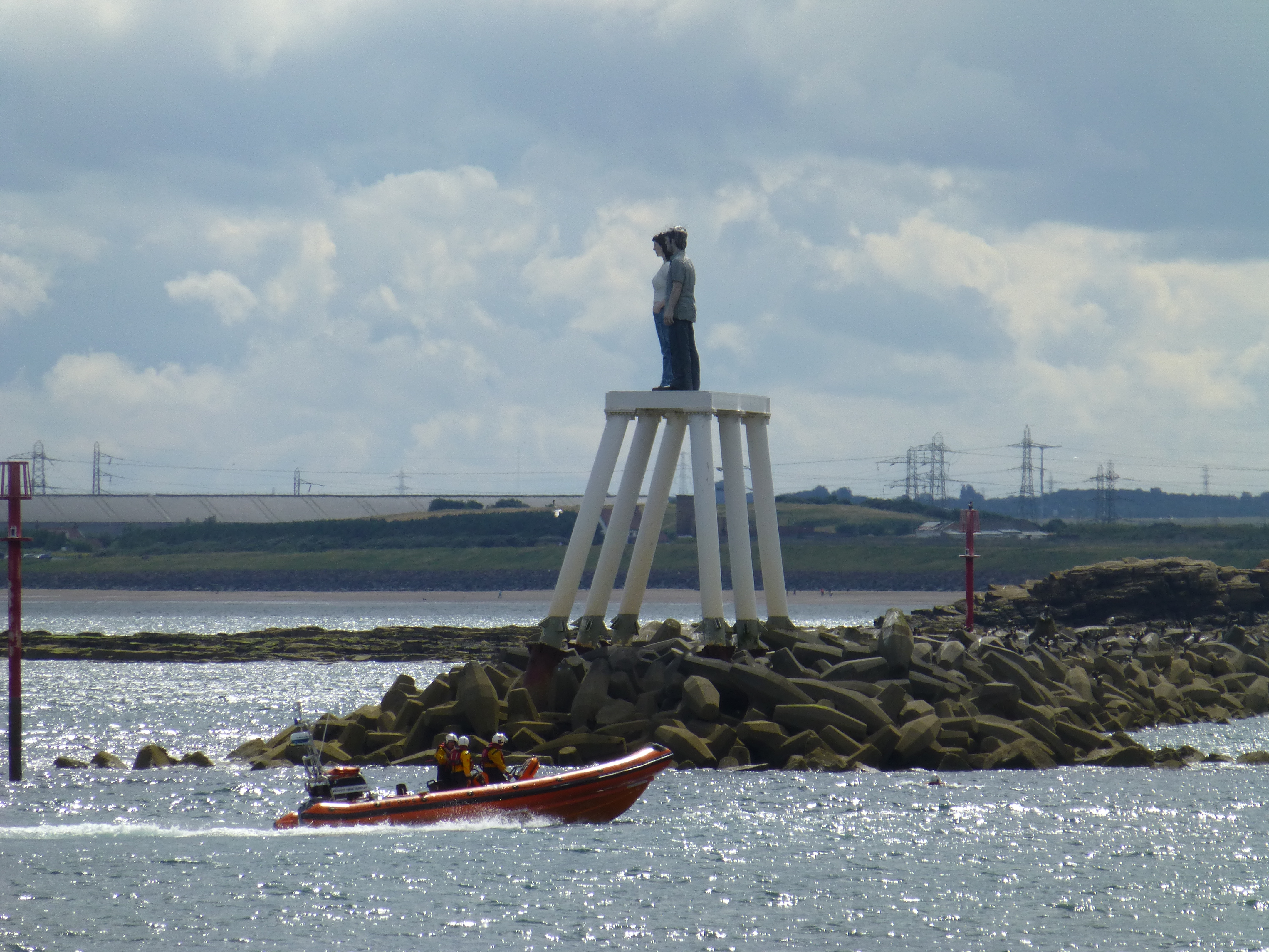 Newbiggin lifeboat moves to the reef area to assist the casualty