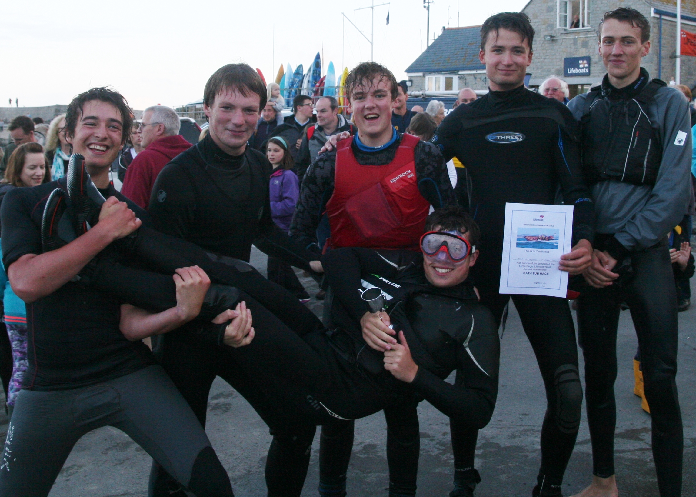Winners of the bathtub race celebrate their victory.