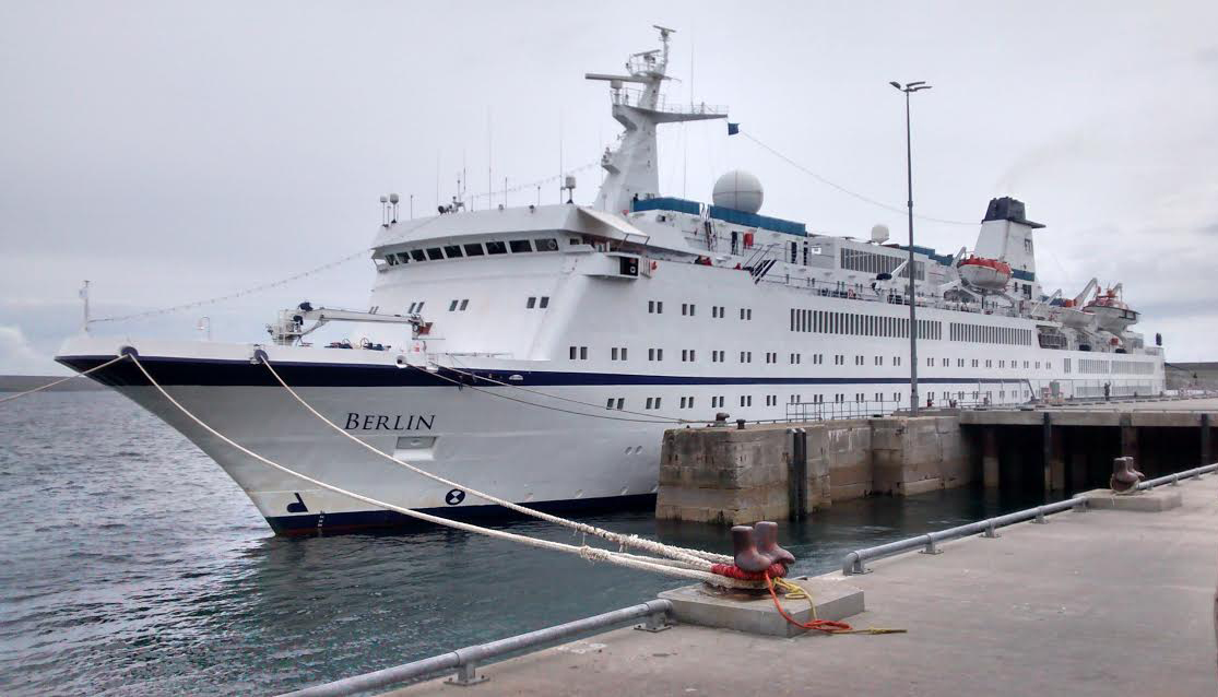 Cruise liner MV Berlin berthed at Lyness