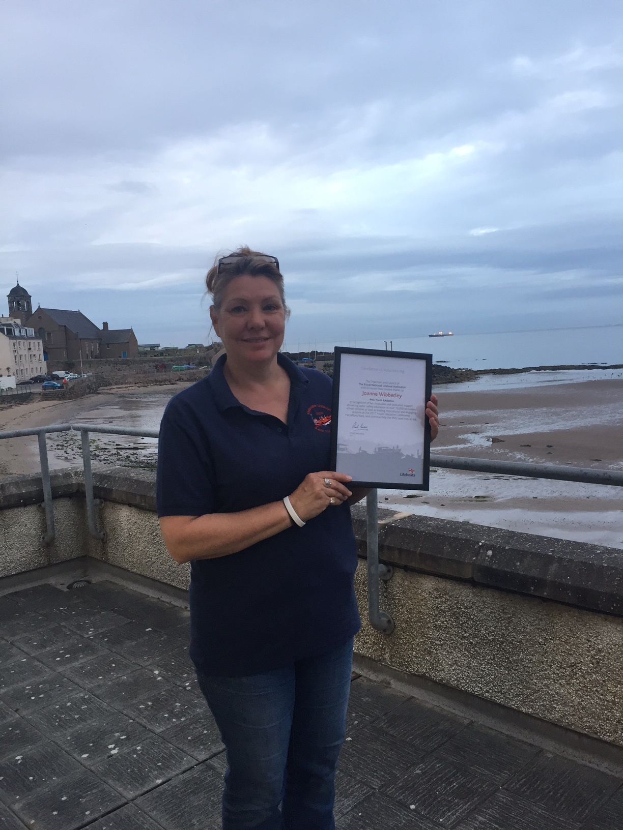 Joanne Wibberley is presented with her Excellence in Volunteering award