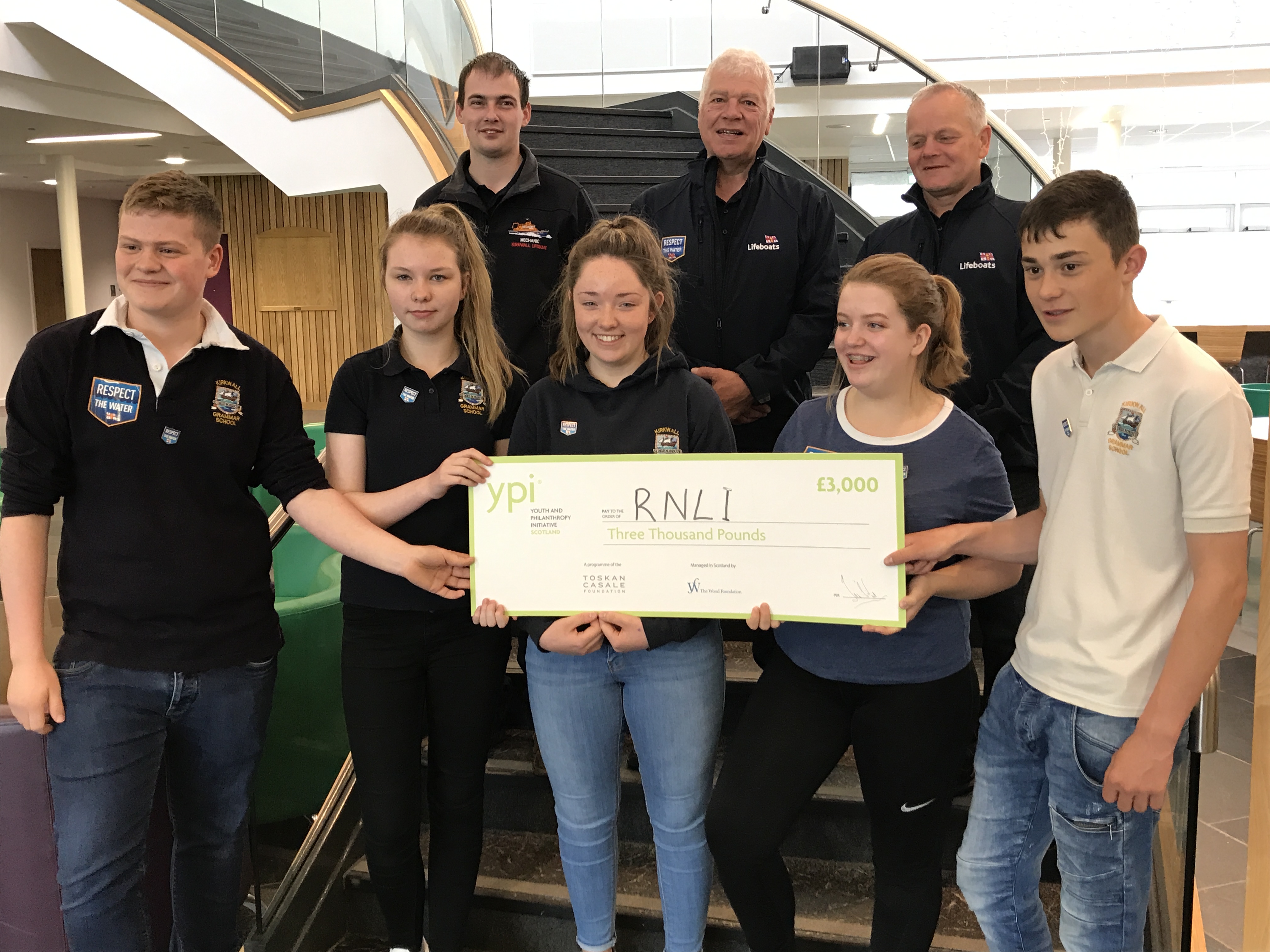 Kirkwall grammar school pupils with some of the RNLI Kirkwall volunteers