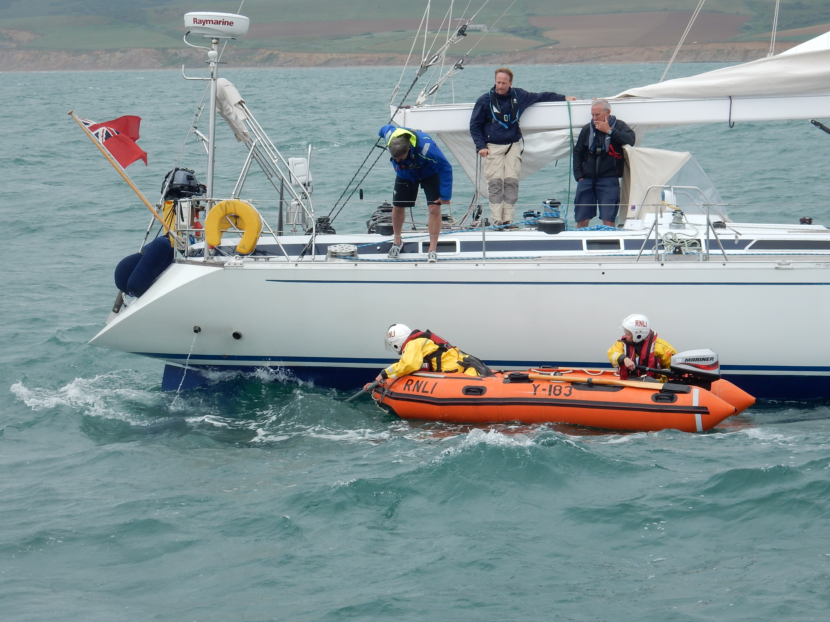 Yarmouth RNLI crew assist with untangling the lobster pots