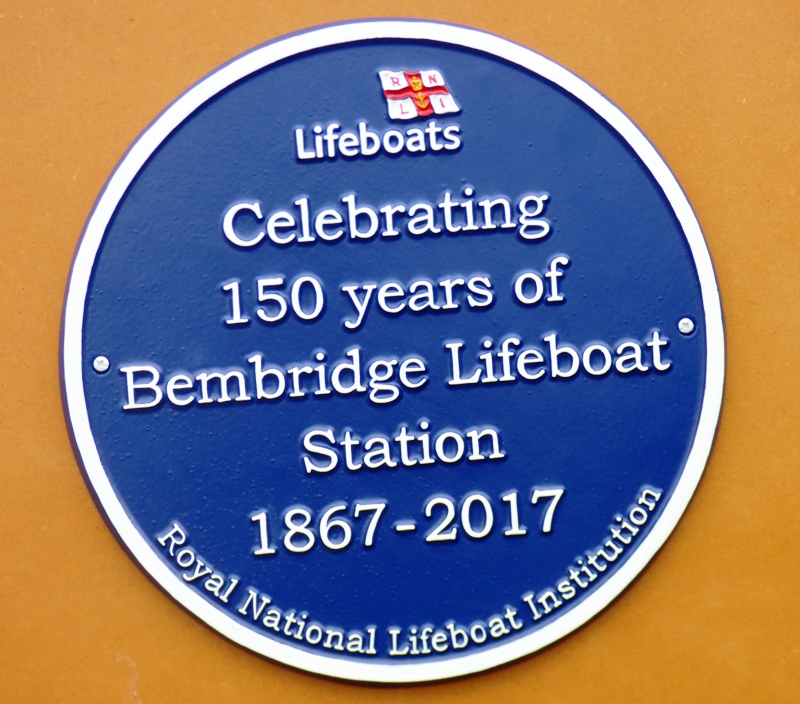 Blue plaque with white writing
