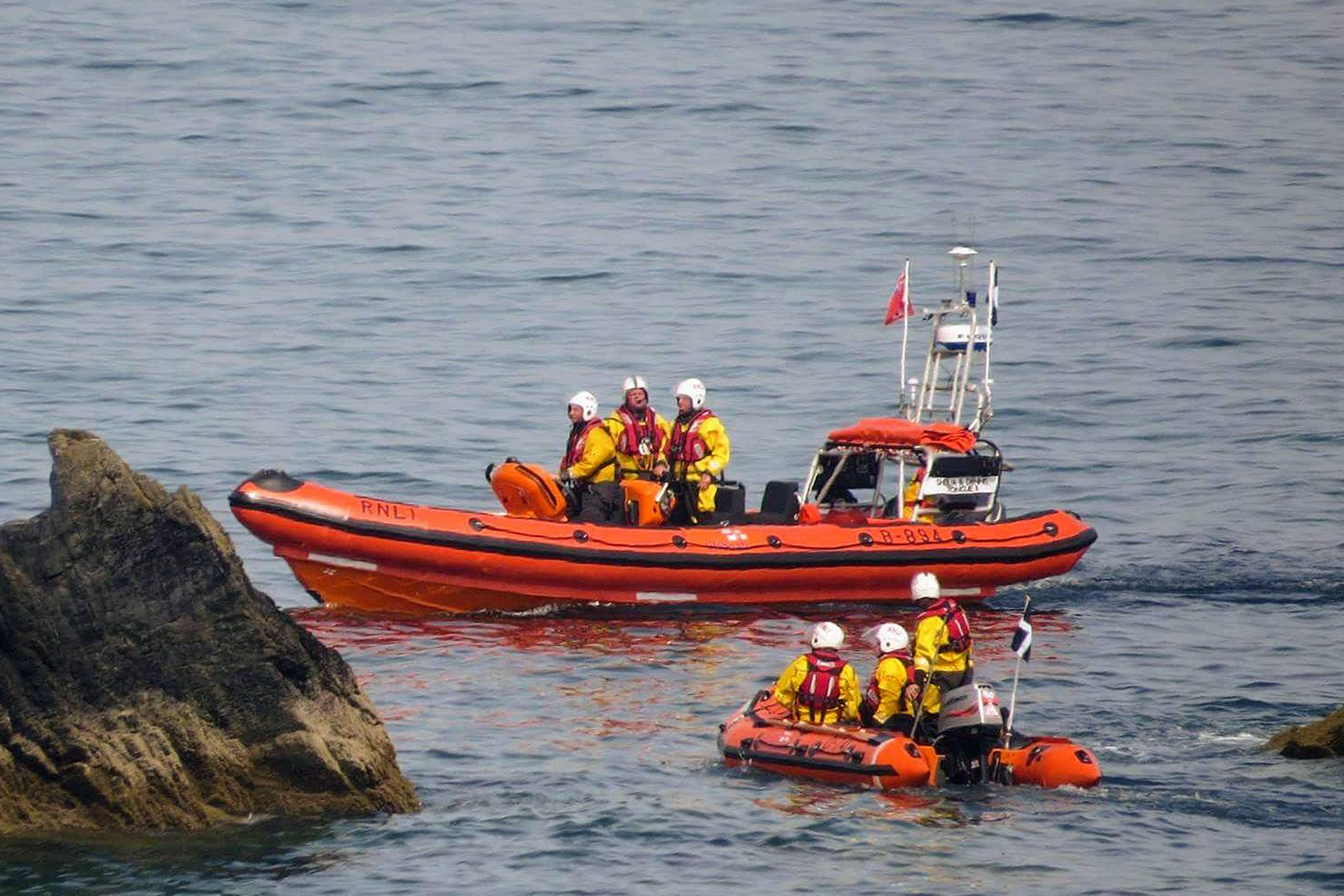 Looe RNLI Atlantic 85 Sheila and Dennis Tongue II and D Class Ollie Naismith off East Looe beach
