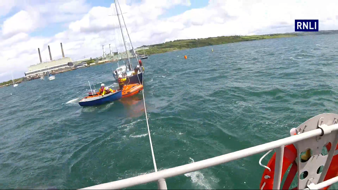 Larne RNLI tow yacht with engine difficulties onto mooring in Larne Lough